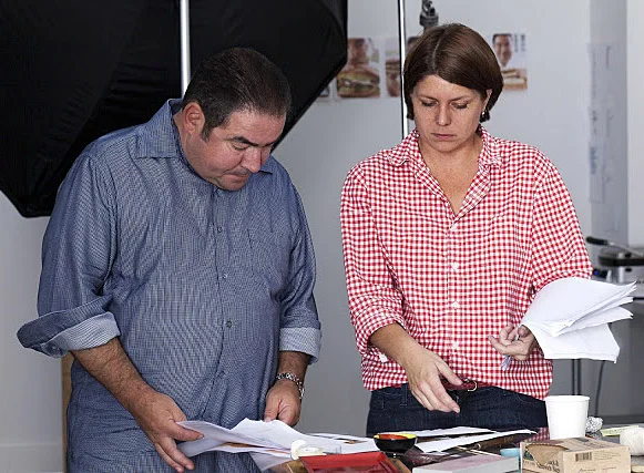 Working with Emeril Lagasse at Martha Stewart Living Omnimedia on his latest book, Kicked Up Sandwiches . Photo by Steven Freeman.