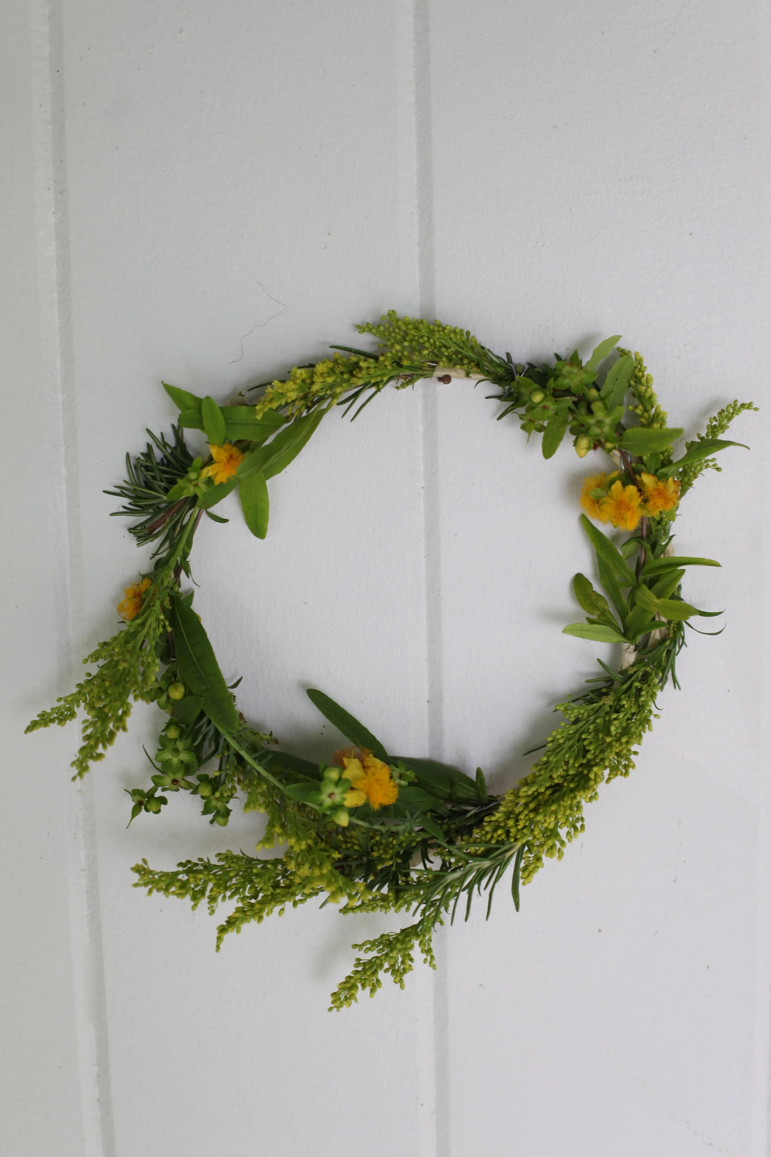 Floral Crown: St. John's Wort, Rosemary, Aster Solidago, and Donkey Tail.