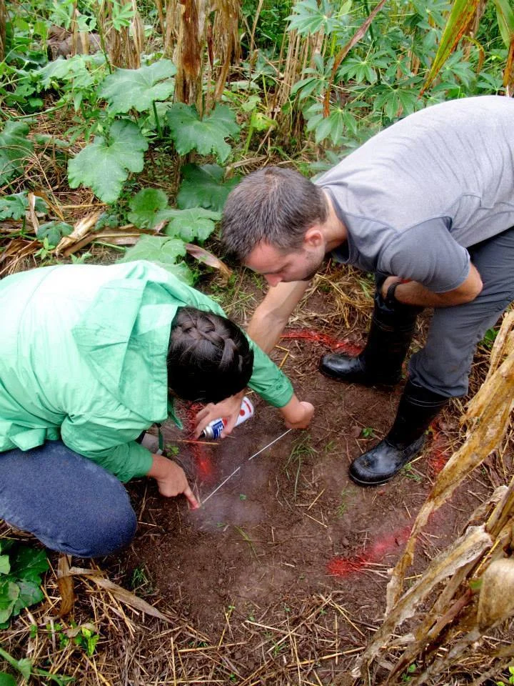 Field Operations Manager Joe South and FIMRC Fellow Jamie Conover constructing one of fourteen latrines at Restauración.