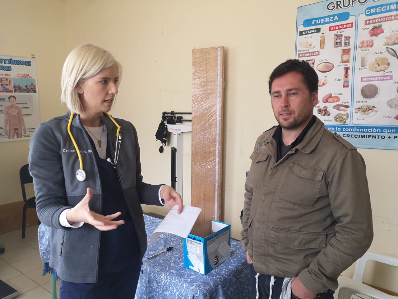 Danielle ( @dmmaltby ) checking in with at FIMRC team member during a consult in her FIGS gear. 