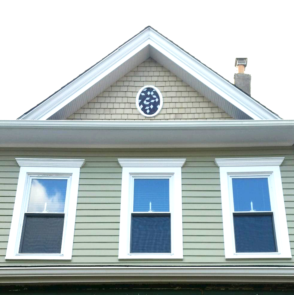 Here's the window installed, with final renovations nearly complete (I believe the shingles and the windowframe were yet to be painted)