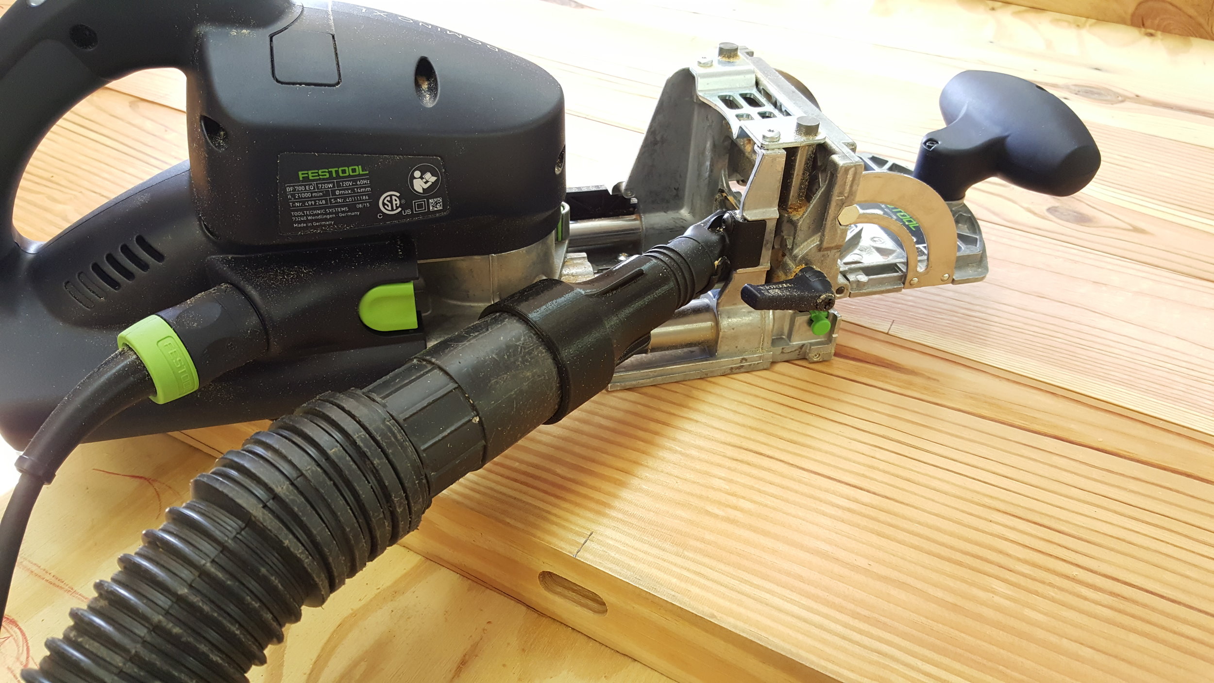 The 3D-Printed adapter was developed to go from a metric and oddly sized mounting to a standard vacuum hose fitting.