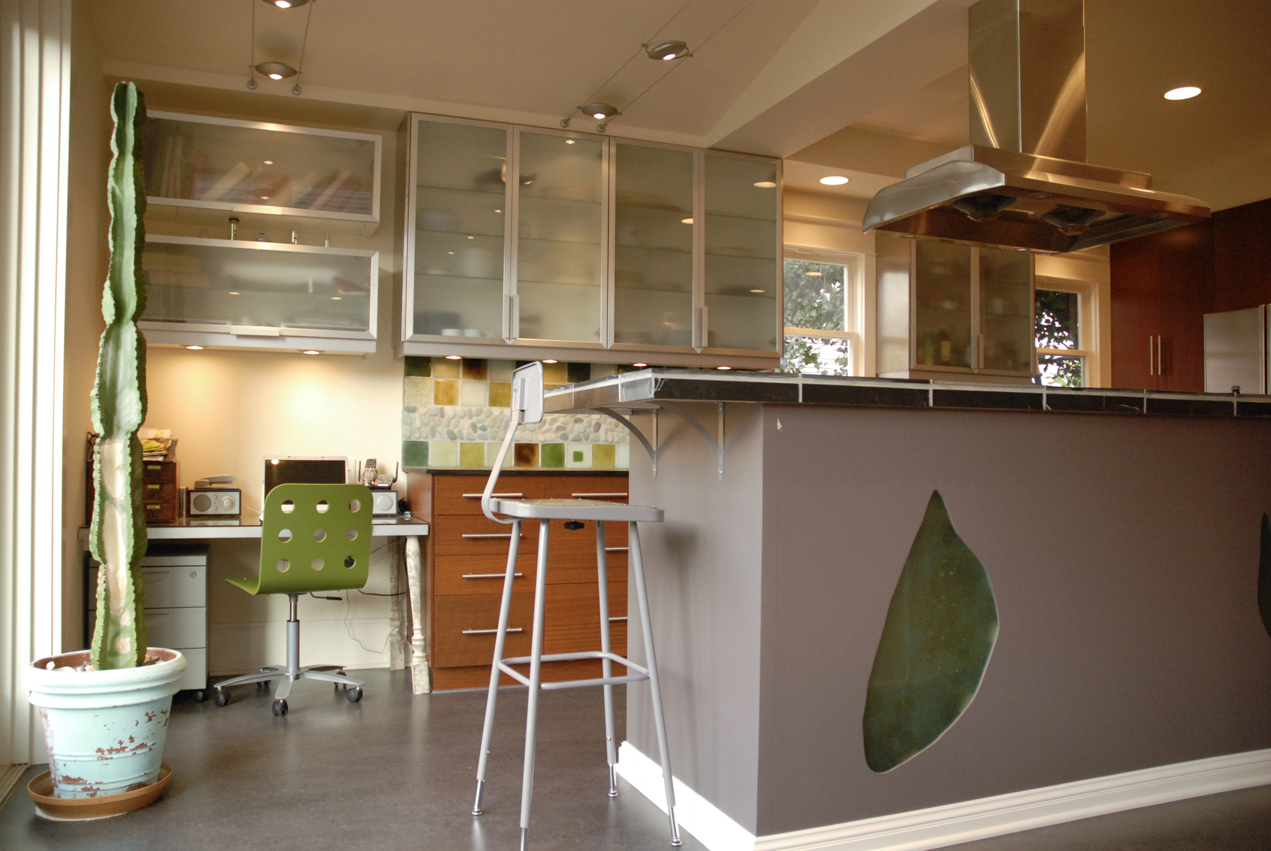 Slag glass island inset reflects light and adds interest