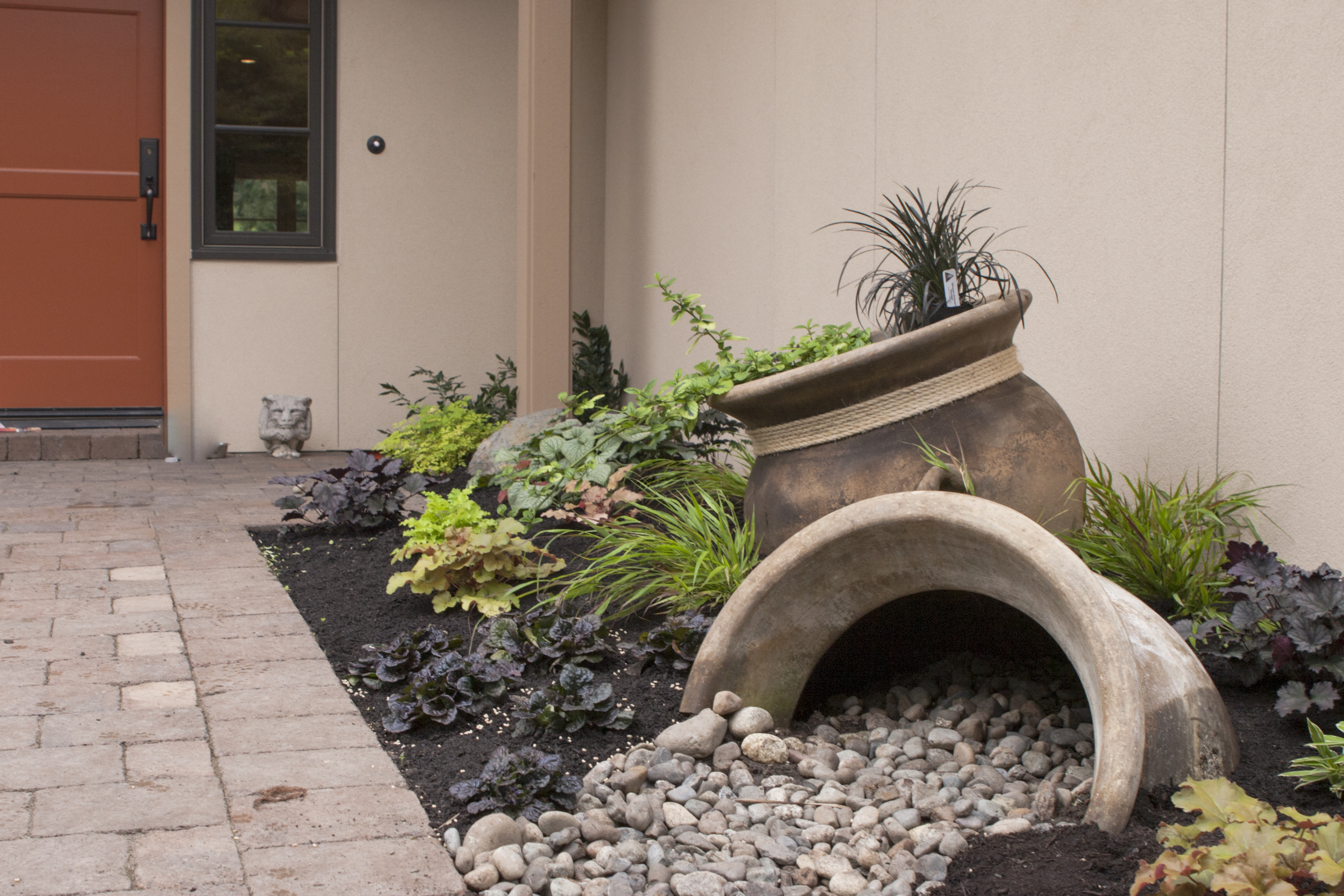 The client a passionate and talented gardener designed and installed most of the landscaping.