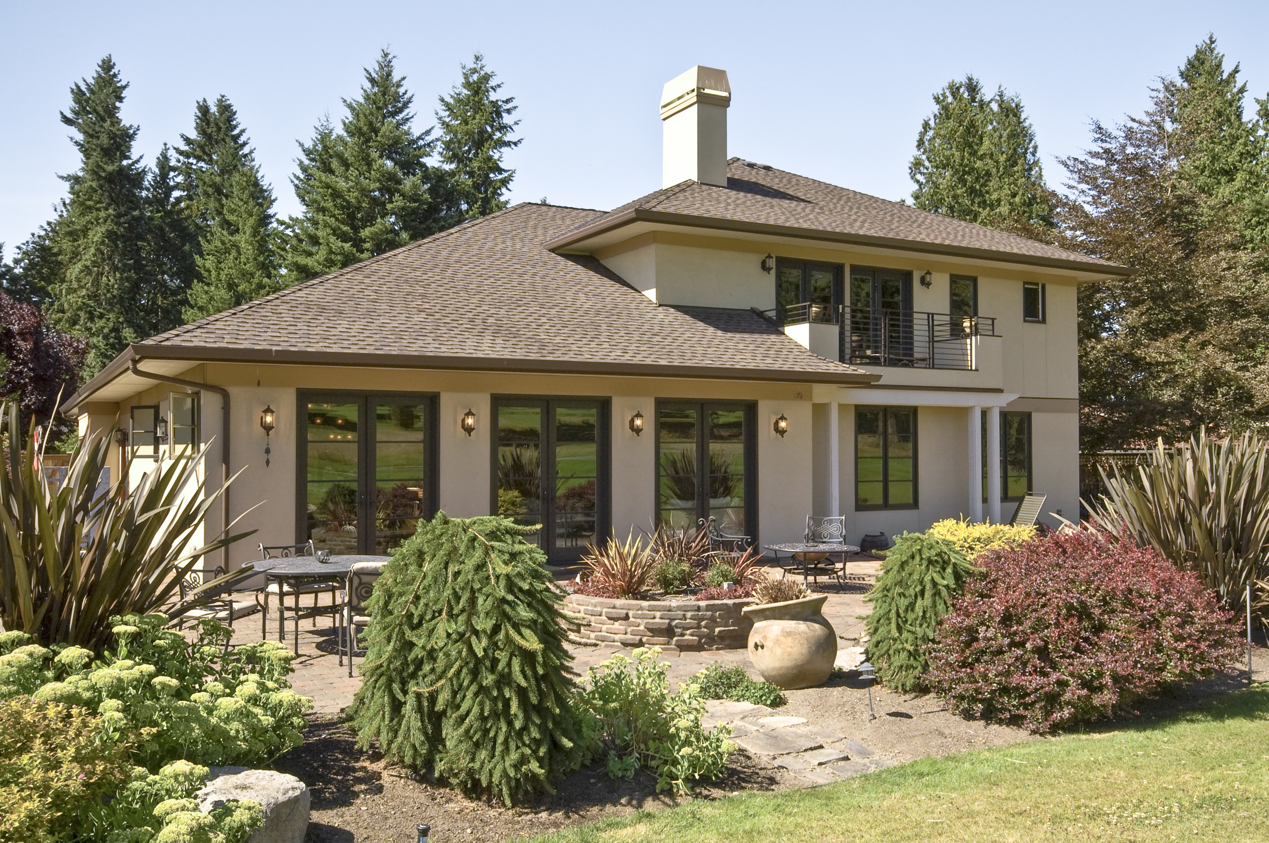 The home is just as beautiful from the back situated on a golf course.