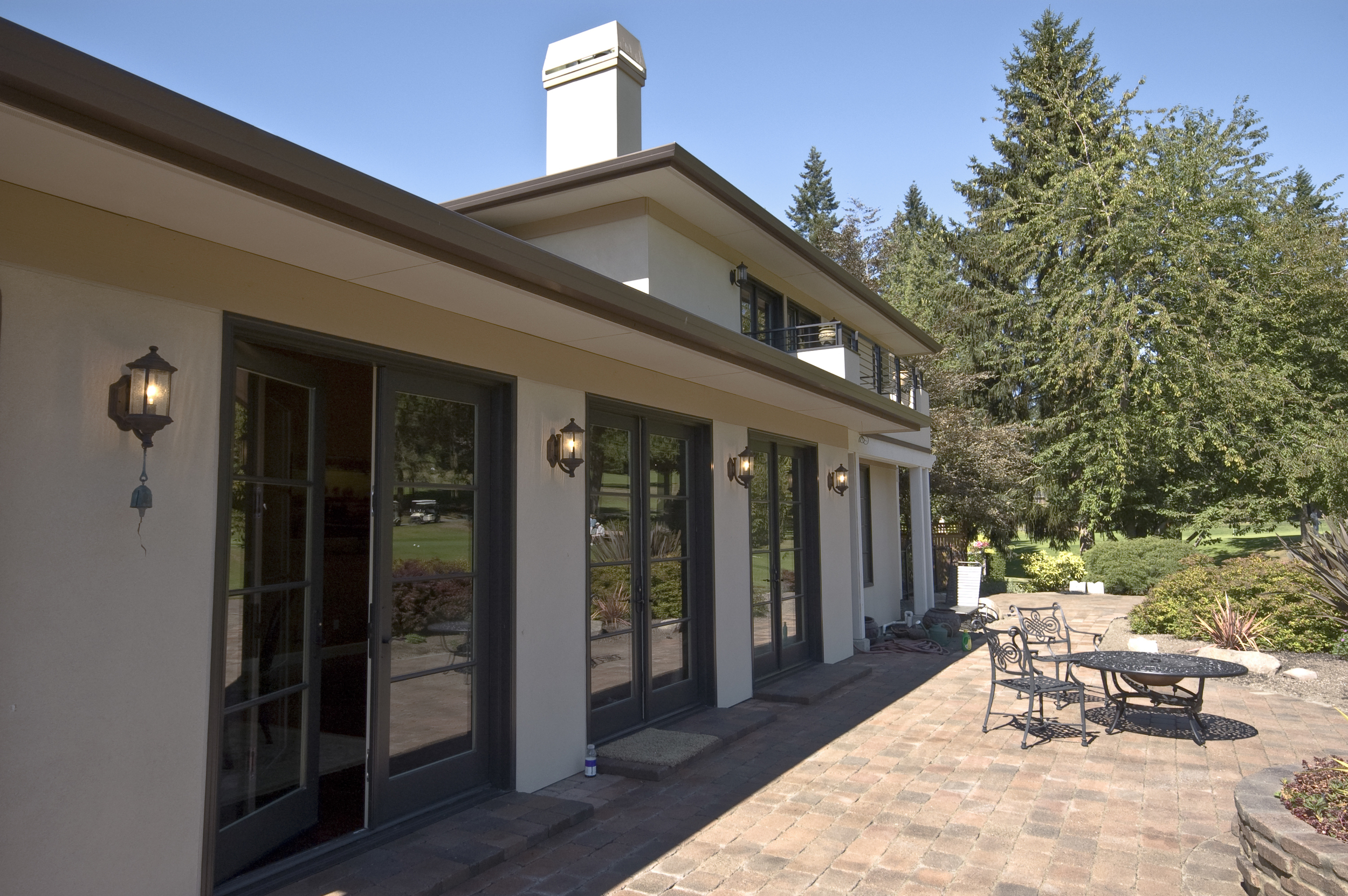 Expansive paver patio takes advantage of the view.