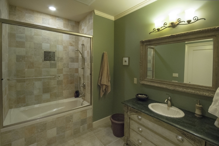 The shower wall and floor tile was inexpensive ceramic.