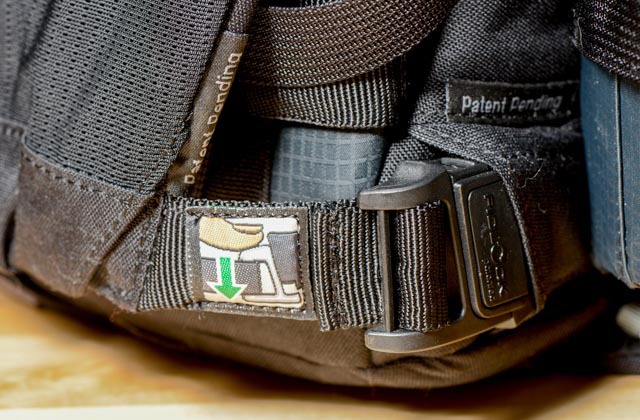 A close-up of the clip that secures the flap. It's magnetic, so you only have to get it close for it to re-engage. The thumb cut-out makes it easy to detach one-handed behind your back.