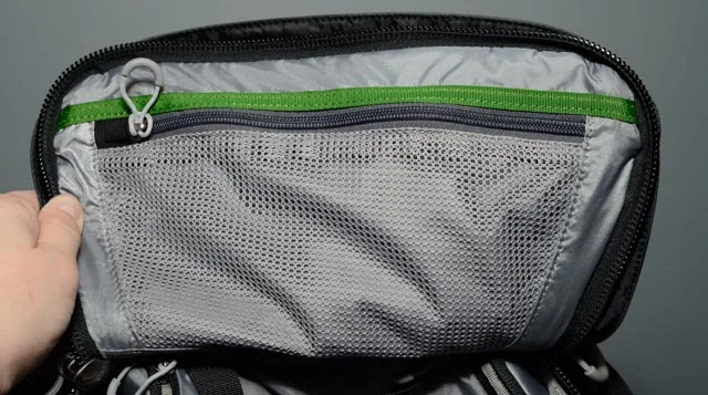 The main compartment can also be accessed via a panel on the top. The influence of Think Tank Photo on this design isn't lost- there's a mesh pocket at every turn!