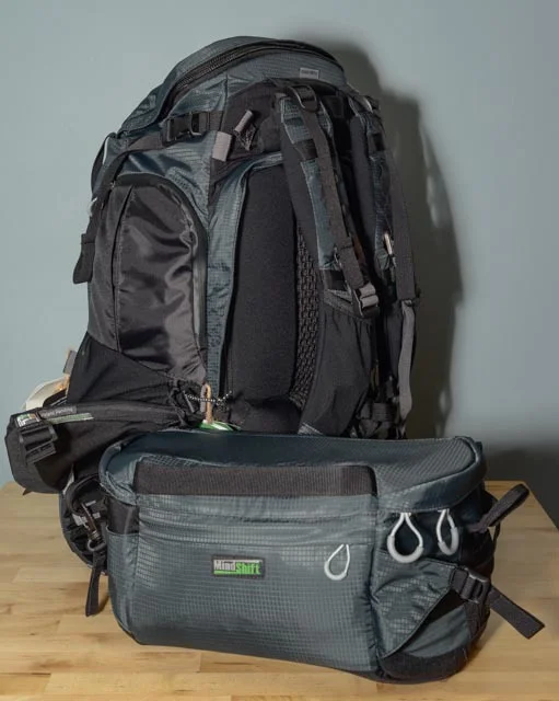 This is what the bag looks like when you've pulled the waist belt out from the backpack. It's the size of a large fanny pack. Although hard to see in this photo, there is an attachment clip here that keeps the waist belt tethered to the backpack so you don't have to stress about dropping this if the waist belt suddenly disconnected (unlikely). 