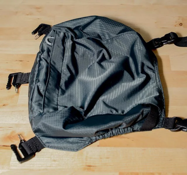 This is the top pocket accessory. This is super handy if you are going on a weekend hike and hoping to use this bag as your primary backpack for the trip. This pocket could hold some critical equipment to make that sort of trip possible. It attaches with 5 quick clips.