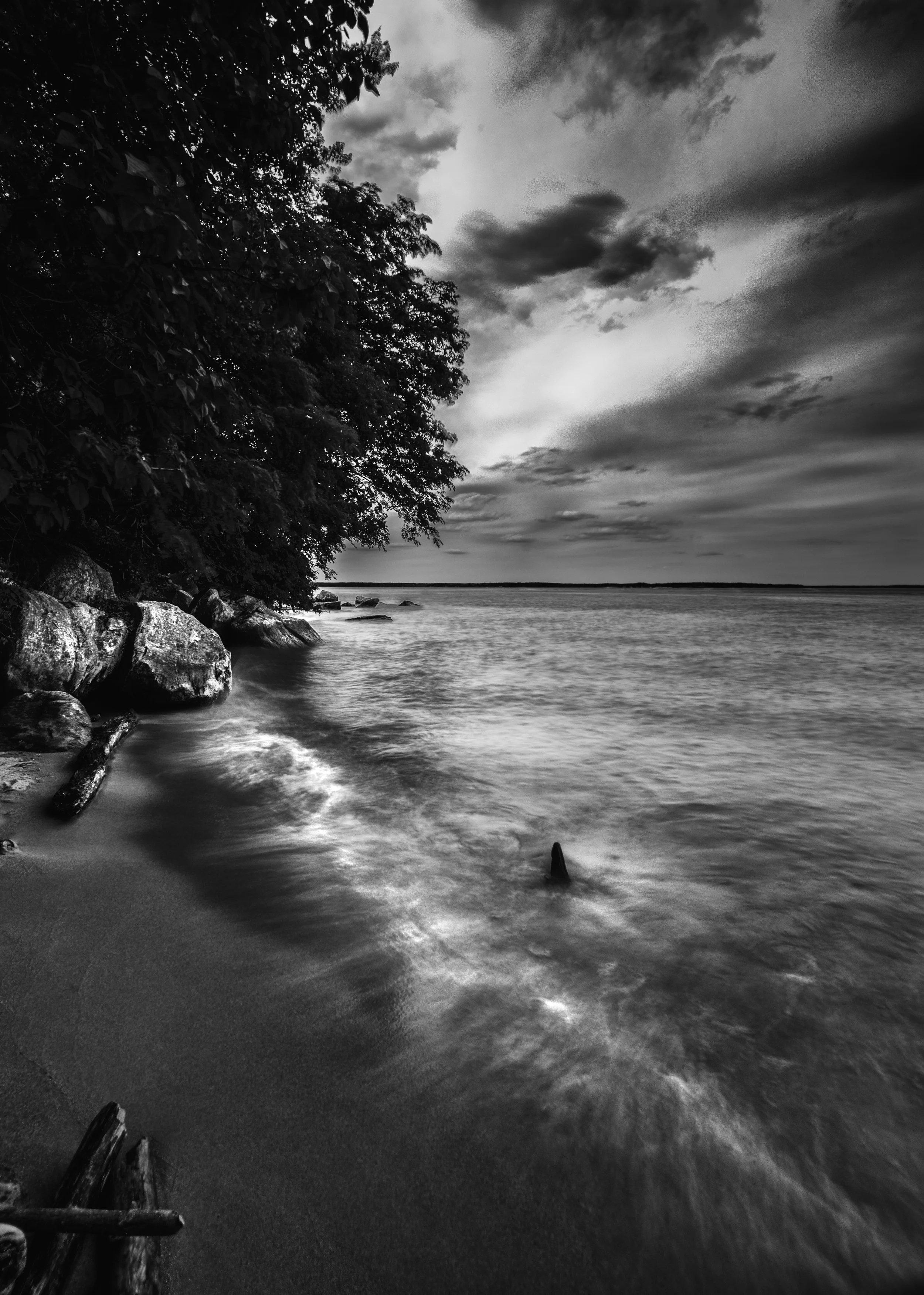 The dramatic rocks and waves at Leesylvania State Park were captured with a merge of three photographs