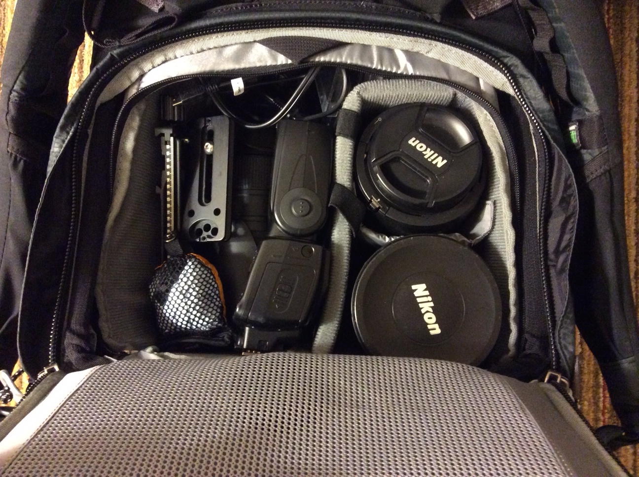 Inside the back compartmented of the Mindshift Gear Rotation 180 - I have jammed it full of gear! I would probably never hike with it like this since it's just jammed up, but this was the best way to transport all of the essentials, including lenses, flashes, camera bodies, chargers, filters, and more.