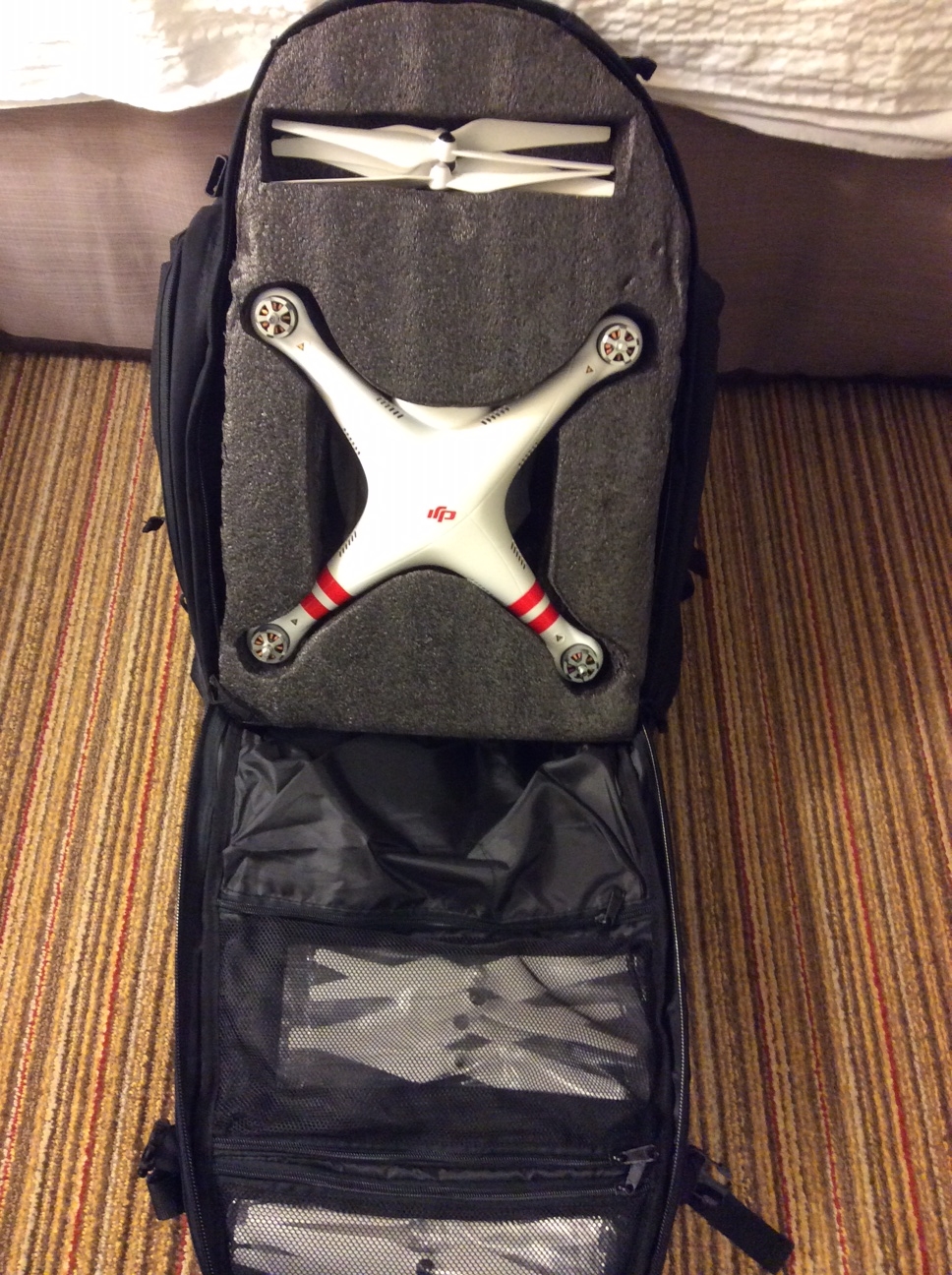 The DJI Phantom Vision 2+ Quadcopter in my custom made backpack. This will be the second "personal item" we will carry on the plane.