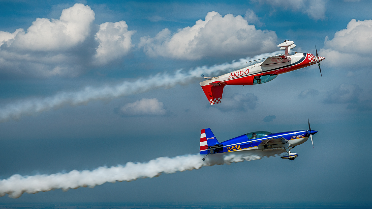 This stunt is known as mirroring. Mark and Chris must demonstrate accuracy, timing, and most importantly, trust, in order to execute this challenging stunt. And yes, they are really just feet apart from each other.
