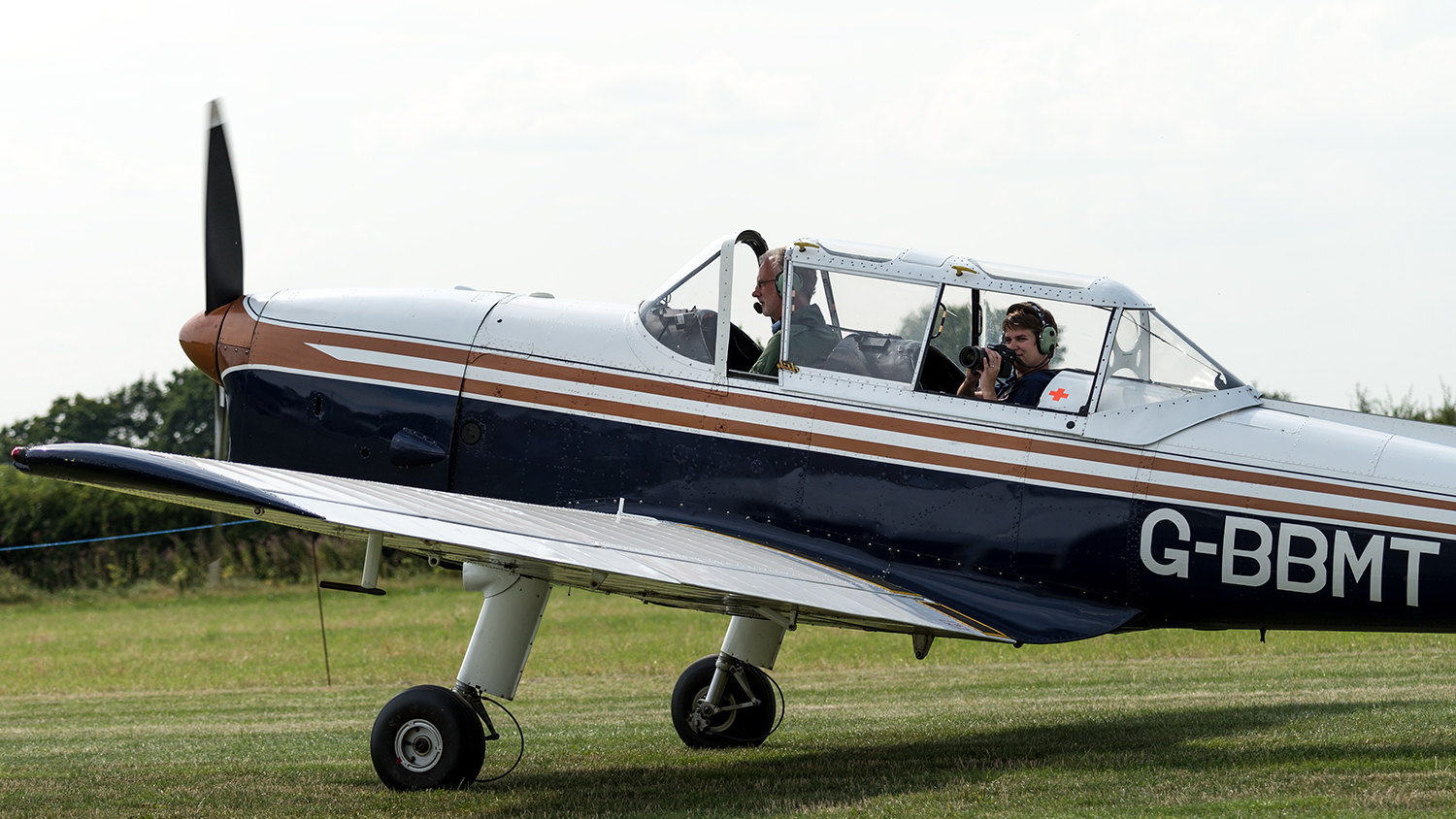 After a safe landing - I'm in the back seat (the canopy was cracked open after we landed so Bob could have some fresh air) and you can see where the glass on the left side of the canopy was removed to facilitate my camera.