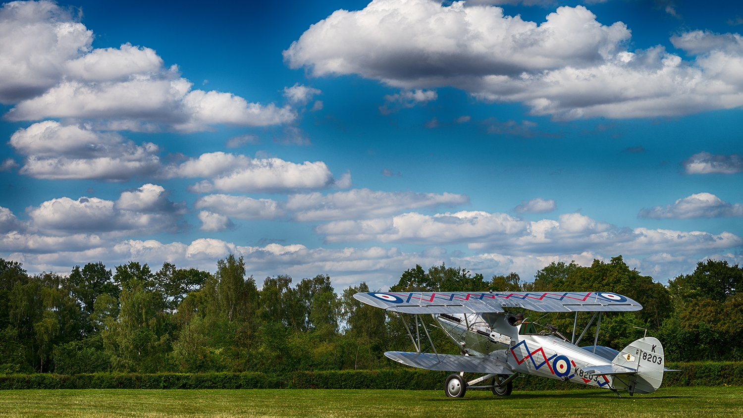 This was one of the half dozen biplanes on display at the show - I love the bright polished finish of this 1937 Hawker Demon contrasting with what was a particularly beautiful British afternoon.
