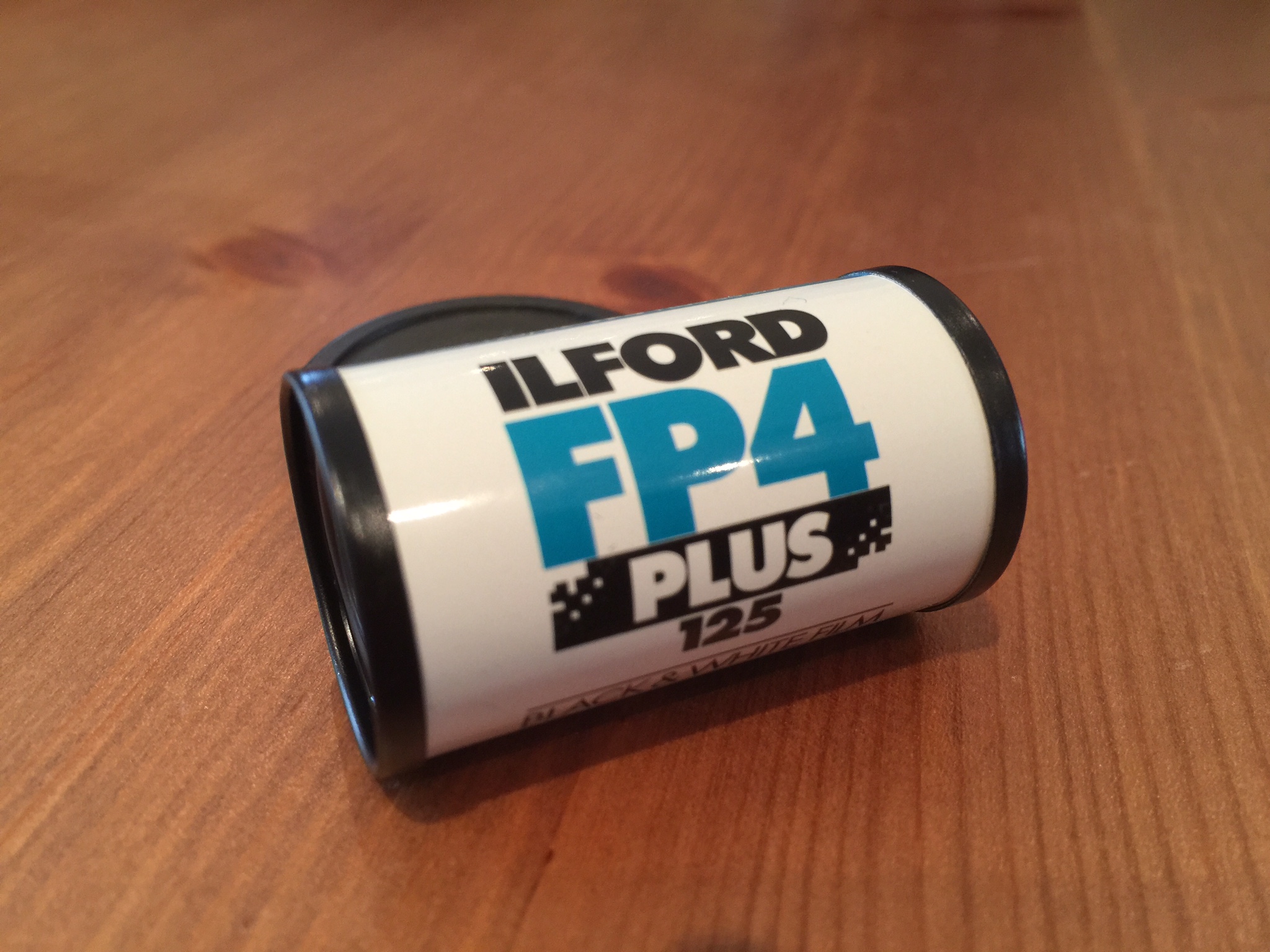 The exterior of a 35mm Ilford FP4 Plus canister