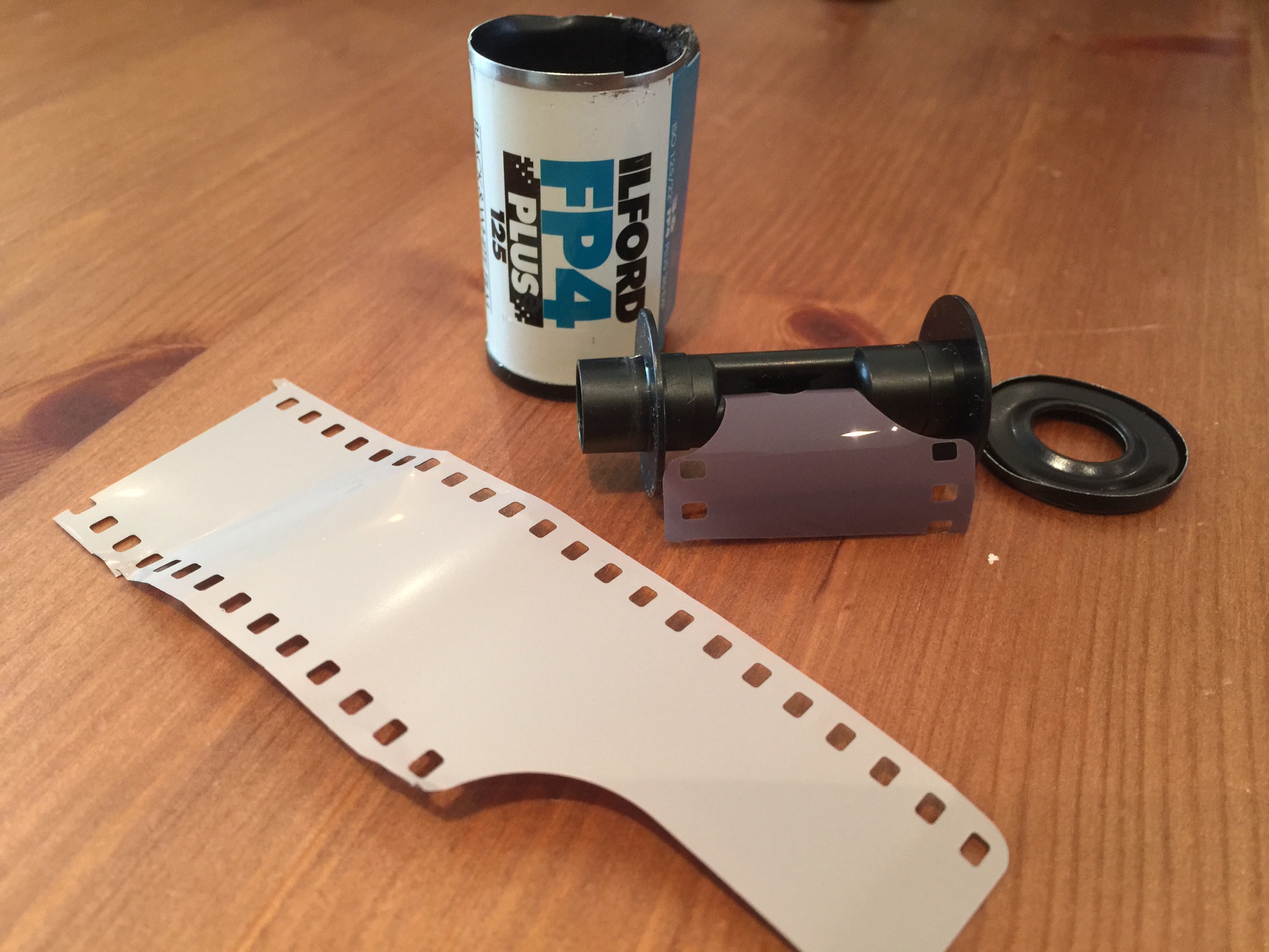 Remains of the 35mm canister once film was removed for developing. 