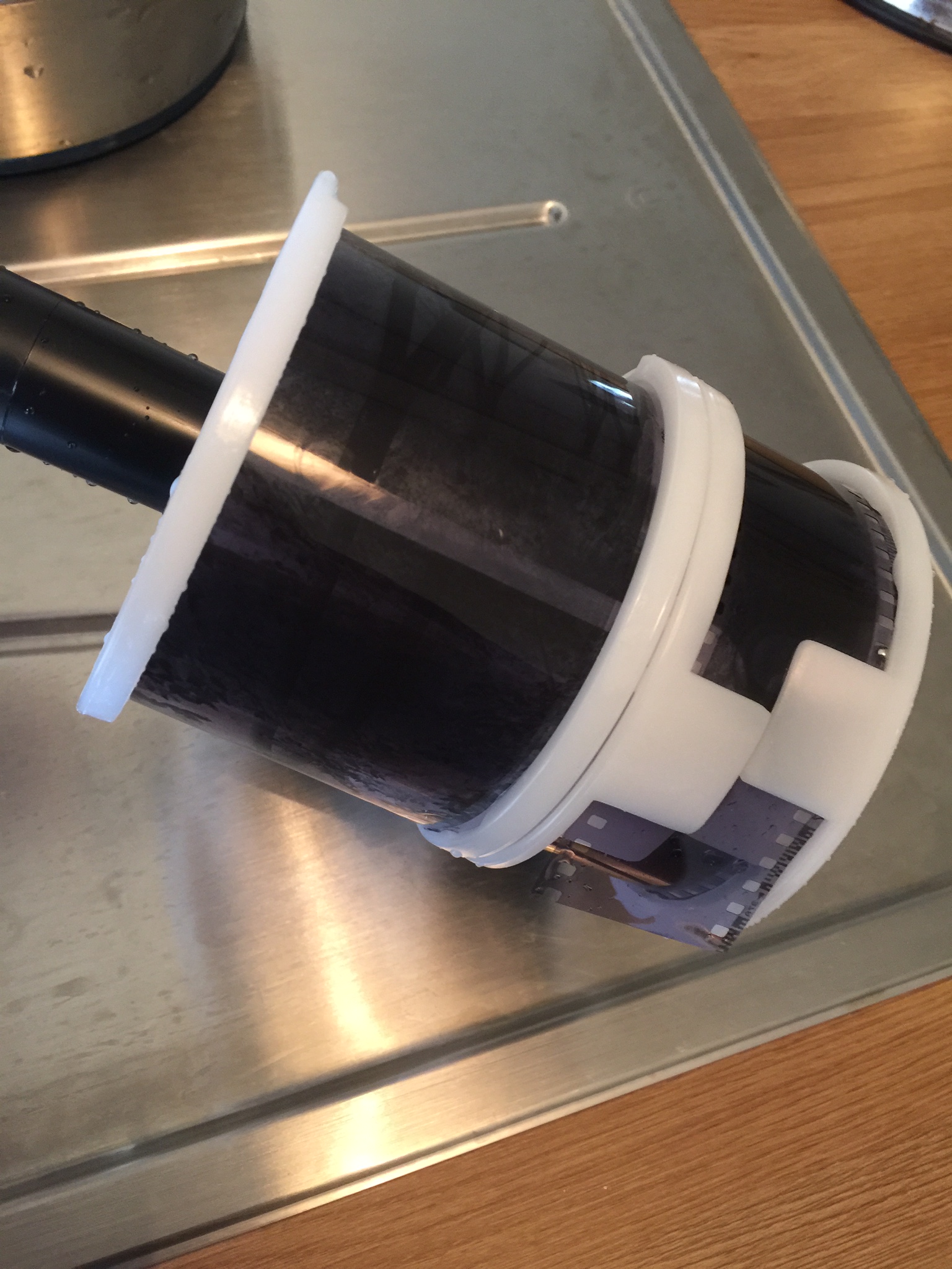 Developed film (120mm and 35mm) ready to be hung for drying. 