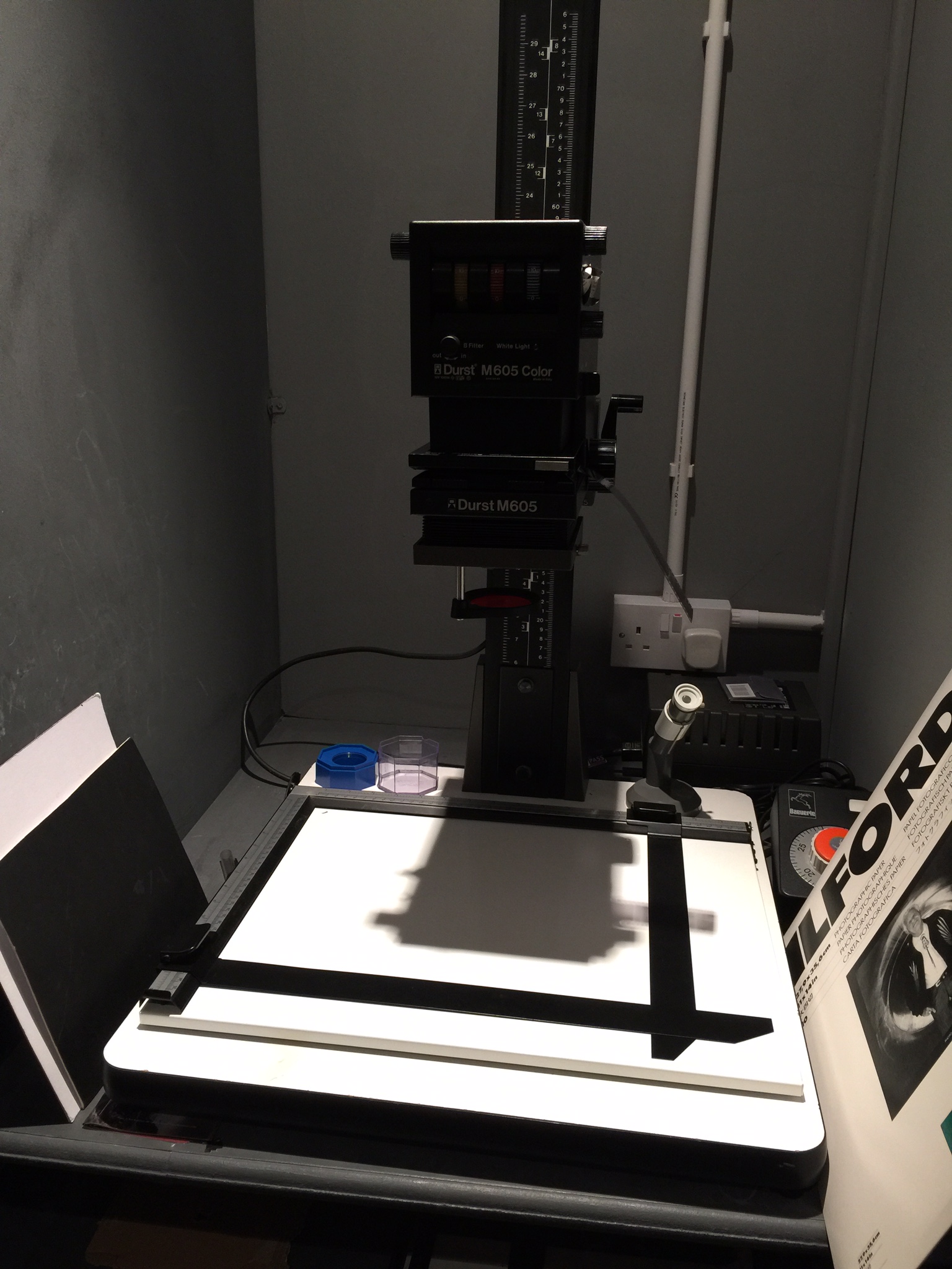 The enlarging station I worked from - this is obviously before the lights went out for the day. The timer is the big orange button on the back right corner.
