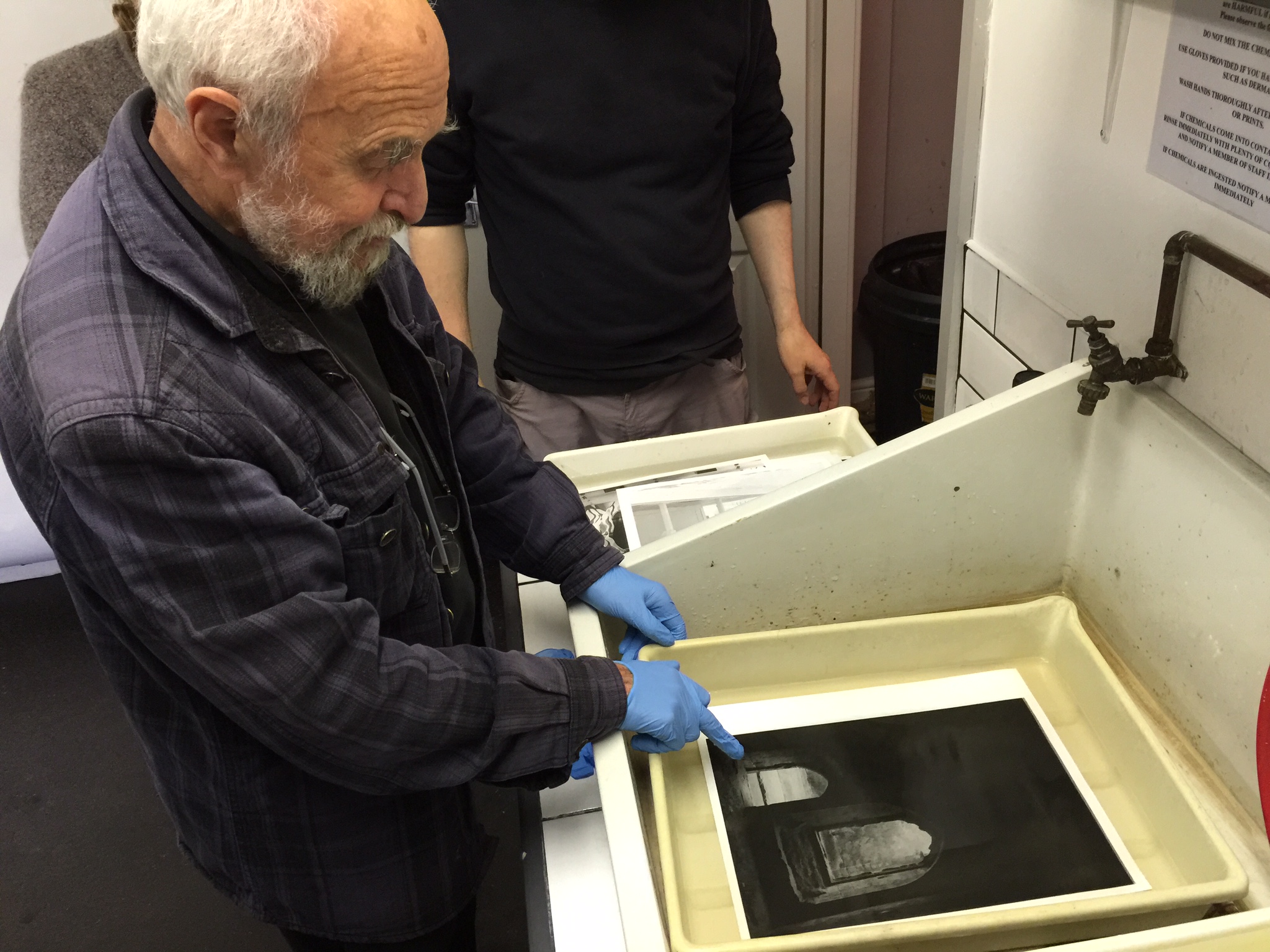 John reviewing some of the work we did- in this case, one of my prints.