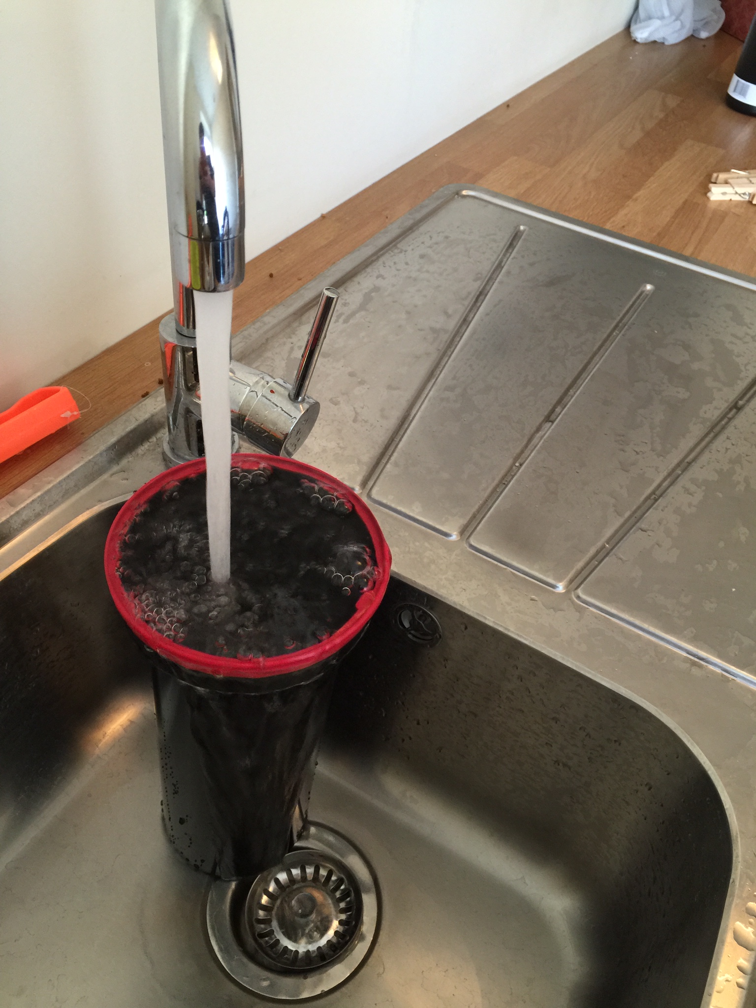 Rinsing is a critical step in development. I always rinse for at least 10 minutes in a heavy flow of water.