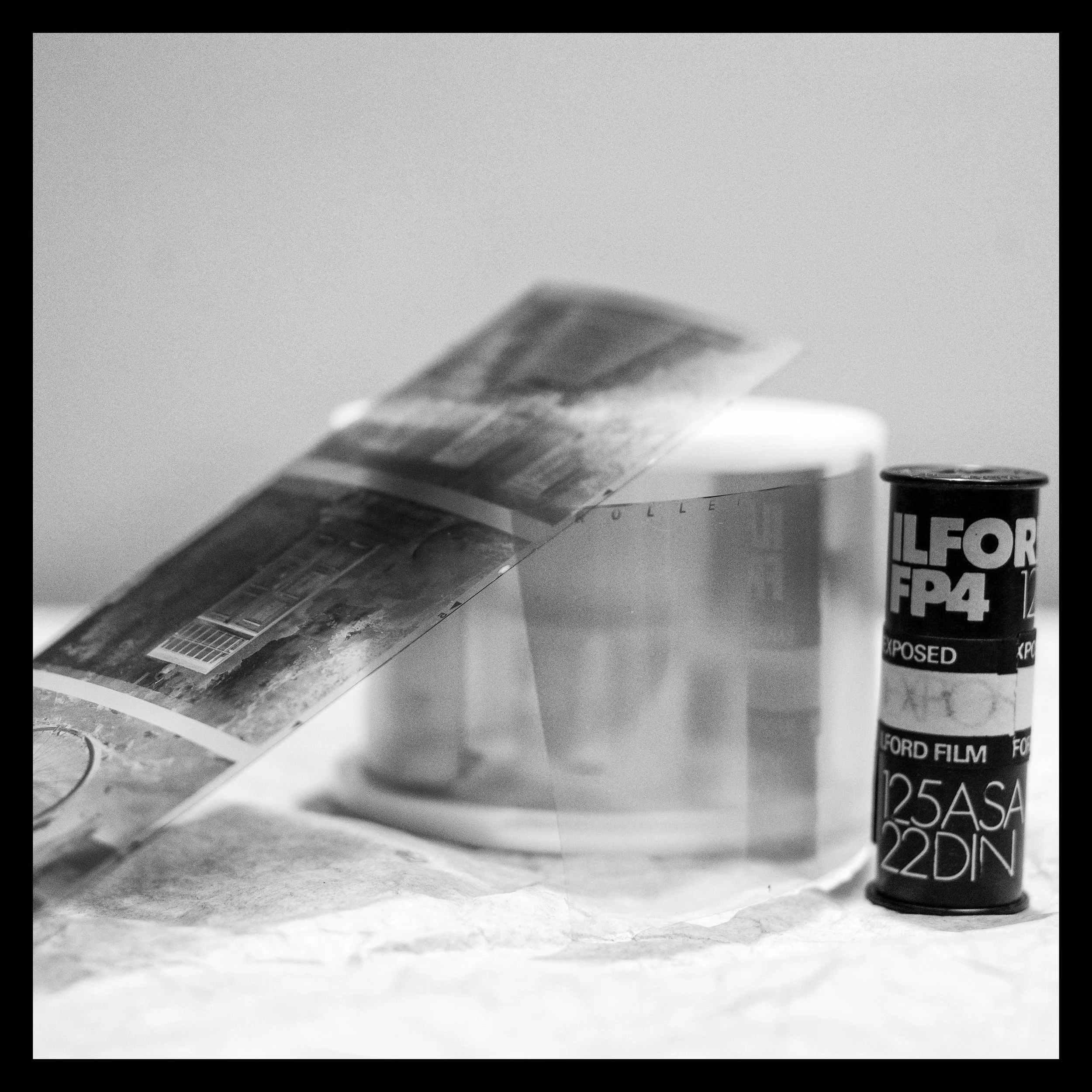 Big negatives are the name of the game. Here you can see a roll of 120mm film once exposed, the developing spool, and some finished negatives.