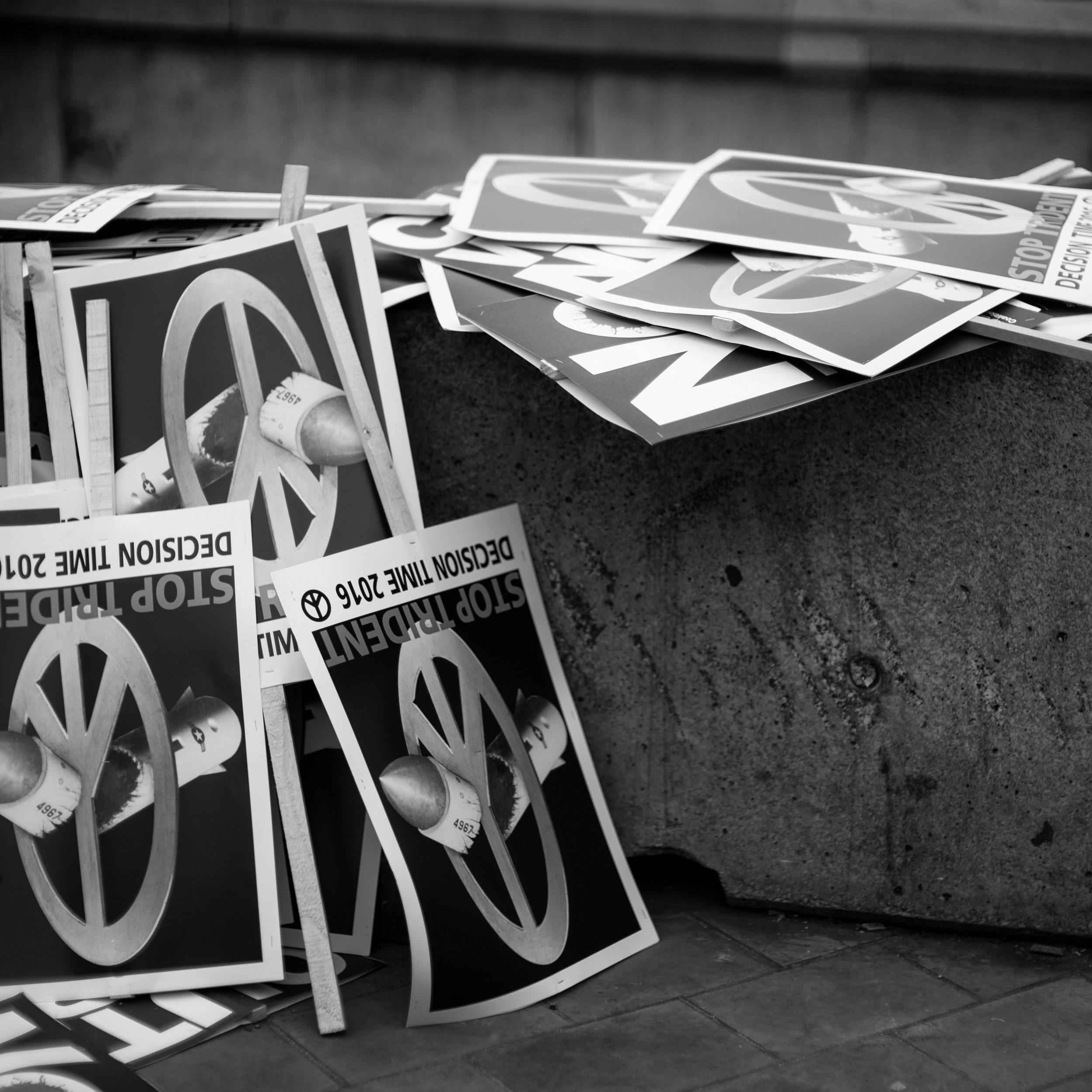 Discarded signs await trash pickup
