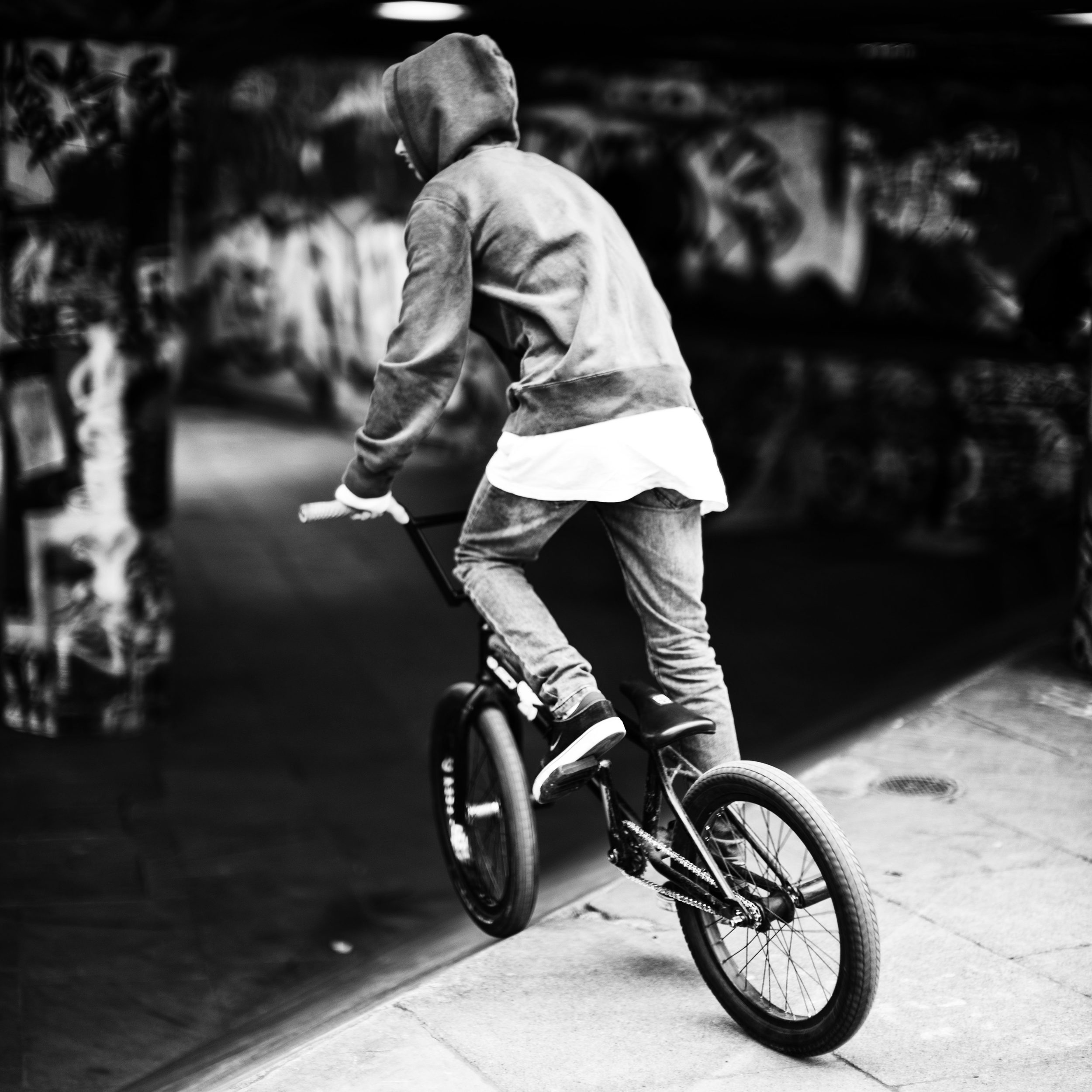 A BMX rider prepares for another trick