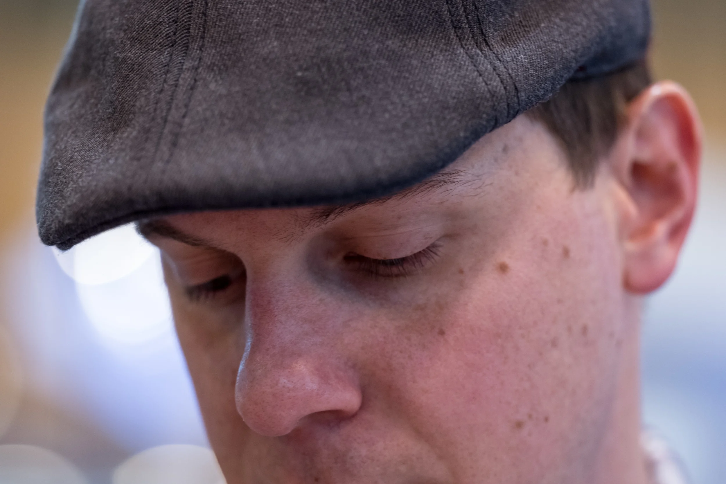My husband's eyes. Shot from about 3 feet away @ 190mm, f/3.5. Nice soft bokeh!