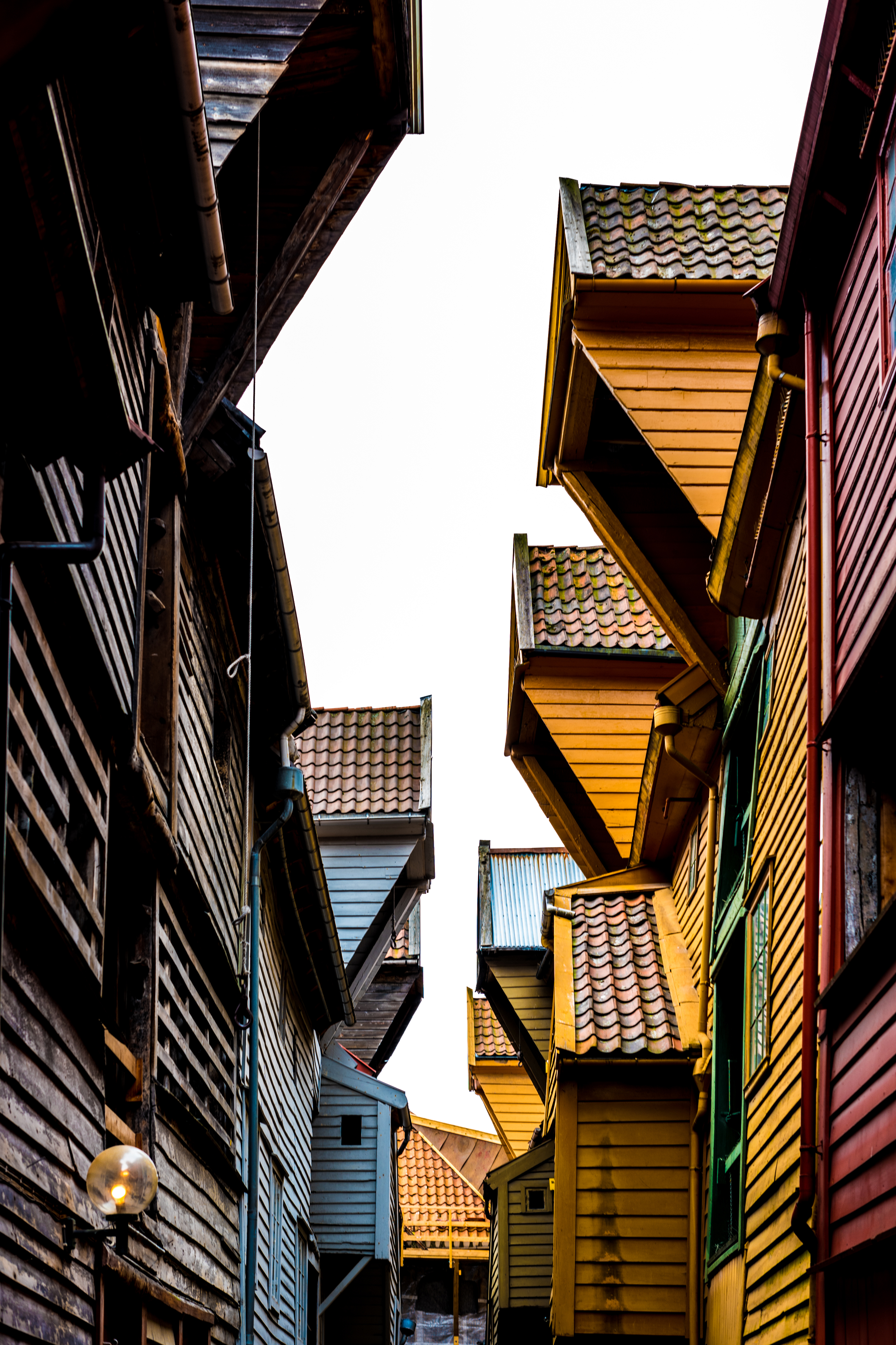 Wooden shops and homes lining the streets of Bergen, Norway