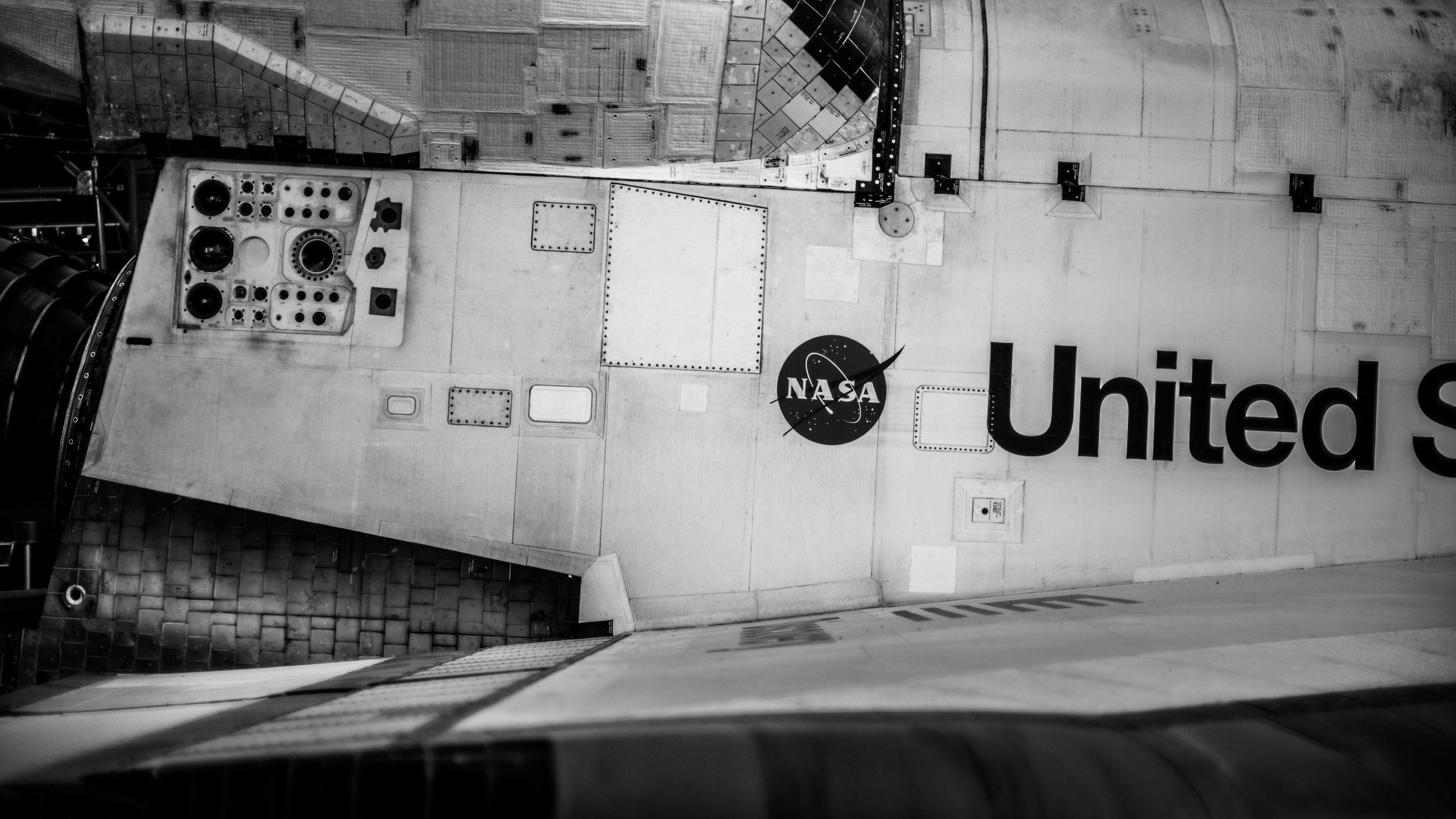 The side of the shuttle, looking across the wings. This is the first time I'd seen a shuttle that had been to space (NASA also had some shuttles that never left Earth that I've seen before) and I was surprised how 'dirty' it looked. You really gained an appreciation for the abuse space flight inflicts on a machine like this.