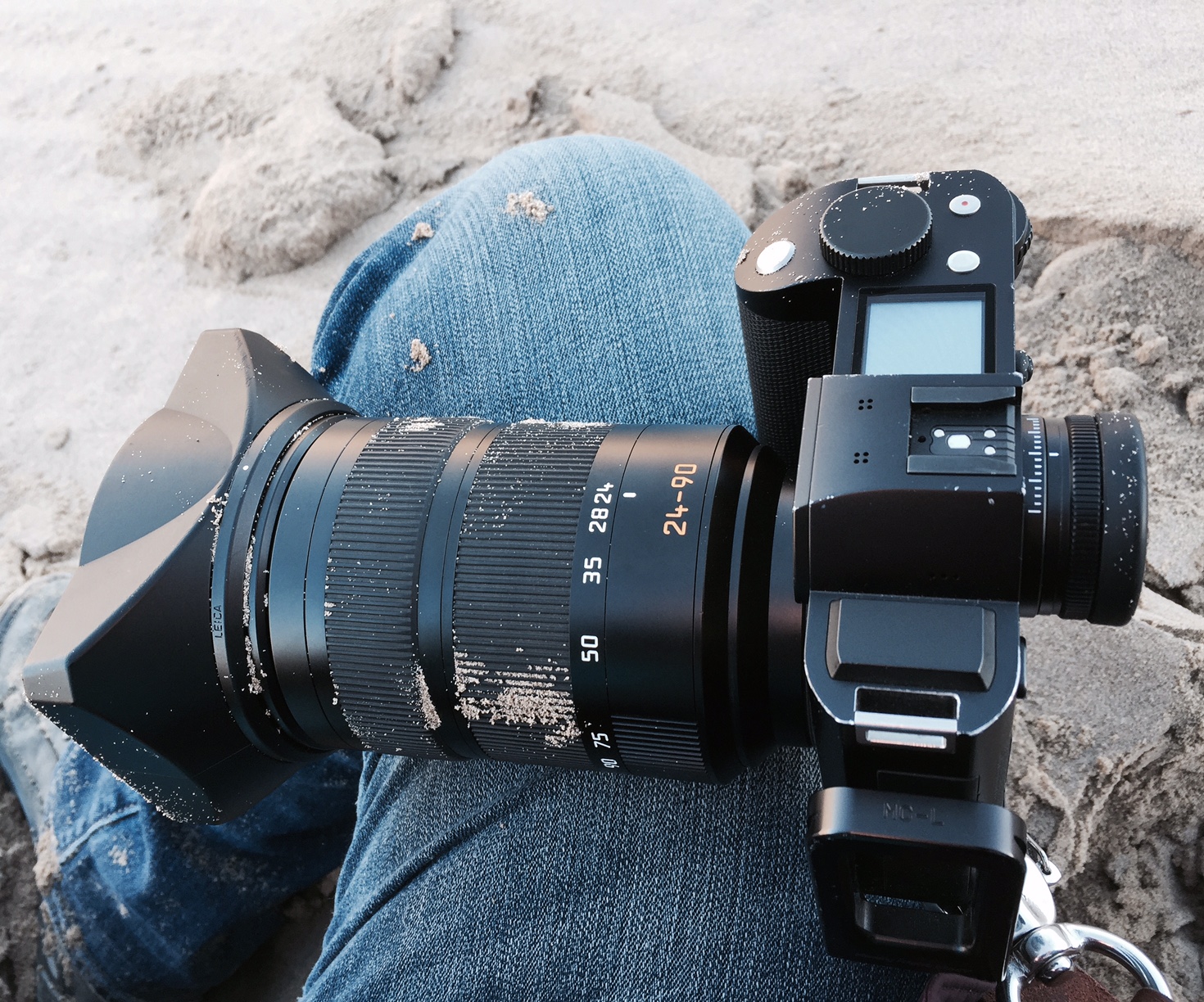 Oops..... Hiking in Death Valley, I slid on a sand dune and landed camera first in the fine sand. The camera was 100% submerged, and this was taken while I'm still laying on the ground, but just after digging the camera out. A little shake off and we're back in business. 