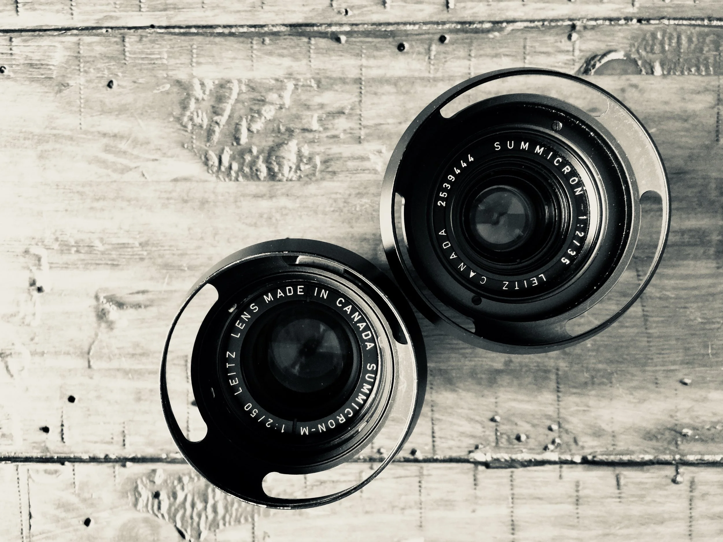 Two beautiful Made in Canada lenses with ventilated lens hoods