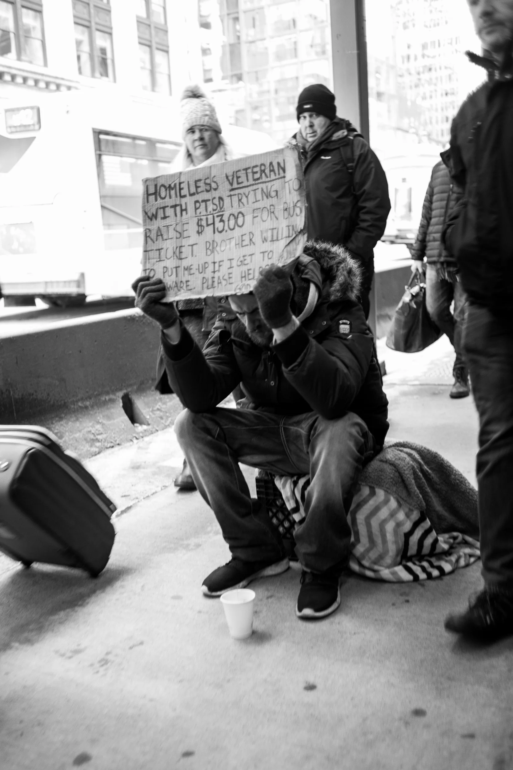 Lost. This is one of the very rare exceptions I have ever made to my rule about not photographing the homeless. This particular gentleman had positioned himself in the middle of the sidewalk, forcing pedestrian traffic to divert around him and creating a bit of a traffic jam. I wanted to capture the reaction from other people to having to divert around him and the story of what his day must feel like as thousands of people pass him by. Leica M10 with 35mm Summicron f/2.