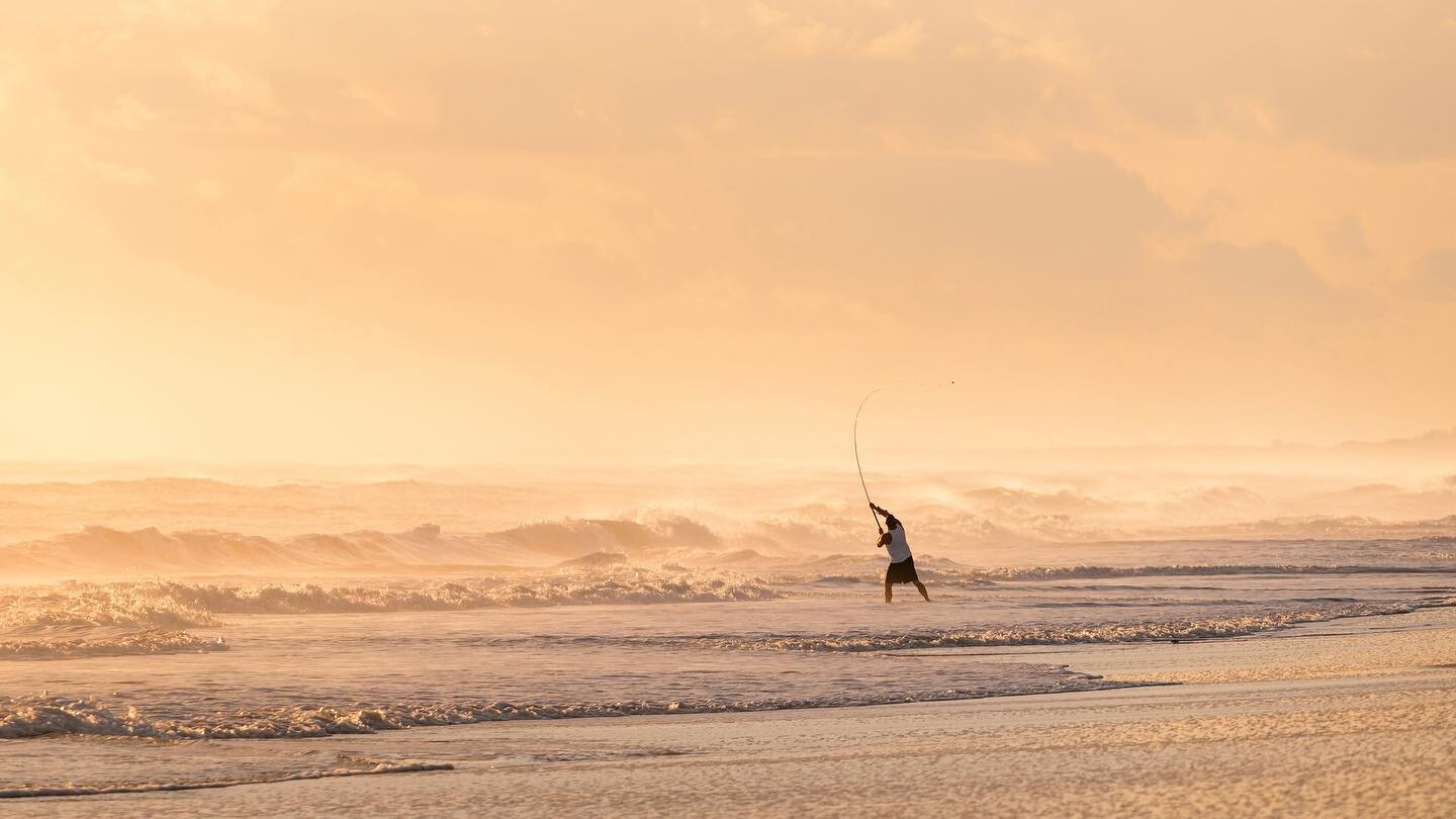 Shot this photo of a fisherman during golden hour down in Cape Canaveral before a SpaceX rocket launch. The waves were quite nice as the remains of a swell were still pushing ashore which helped add some mist &amp; atmosphere to the shot. Shot at ISO
