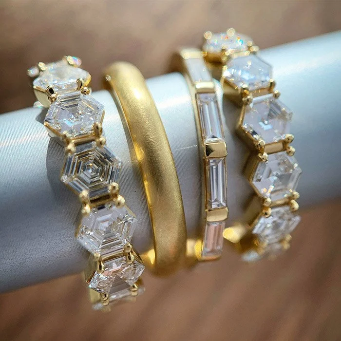 Eternity wedding bands featuring step-cut hexagon diamonds, handcrafted in New York..