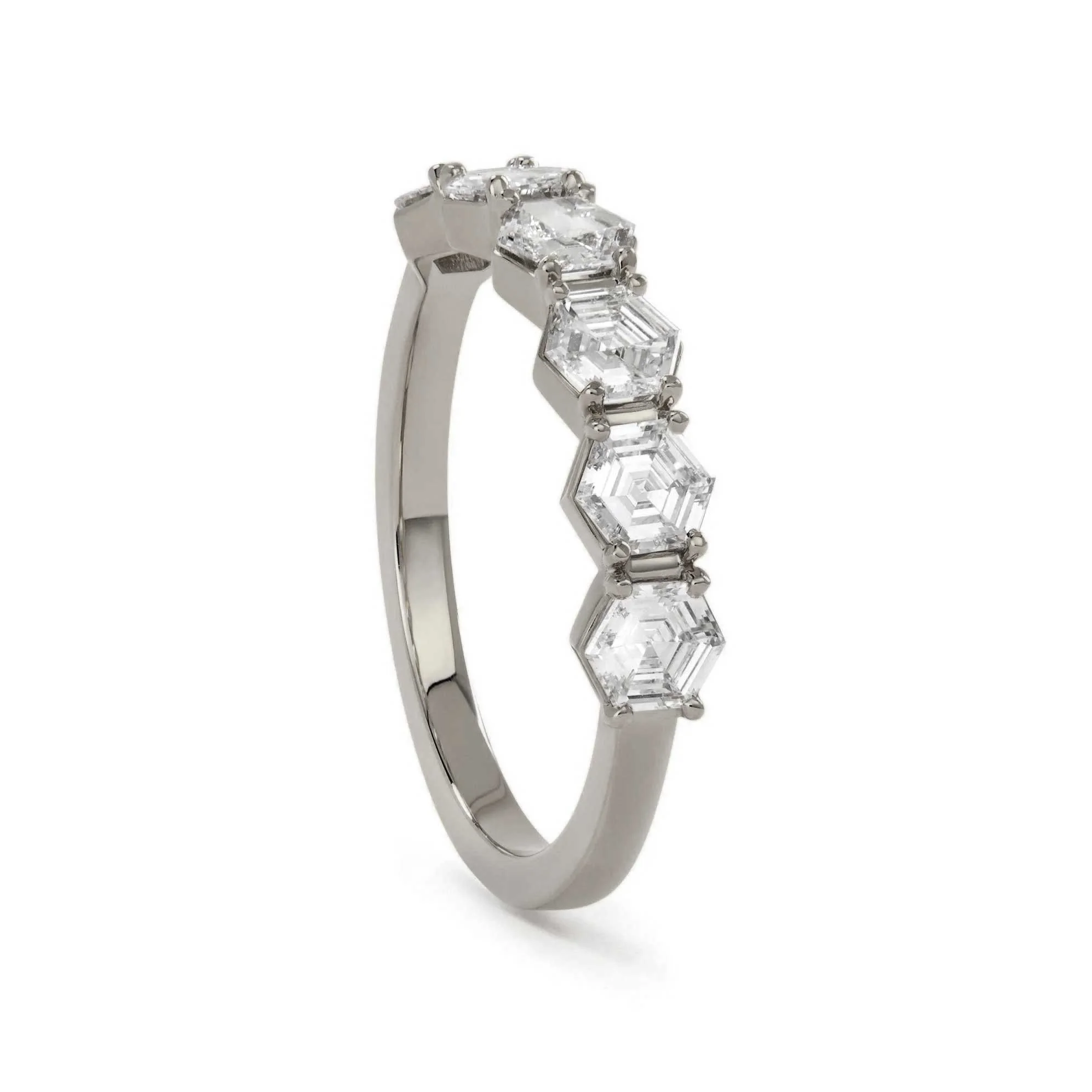 Platinum half eternity hexagon cut diamond ring by Elliot Gaskin.