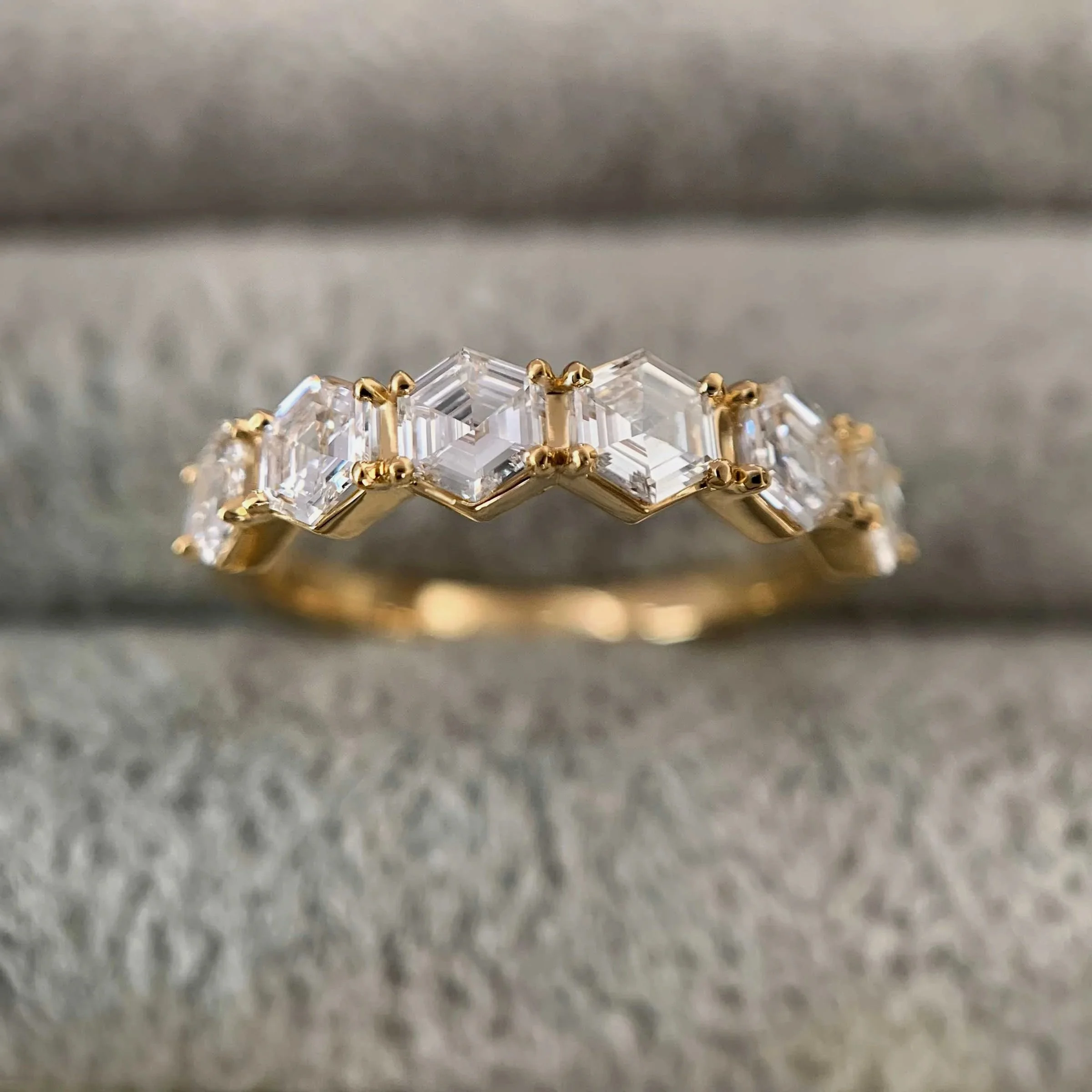 Detail shoot of our signature hexagon cut diamond ring.