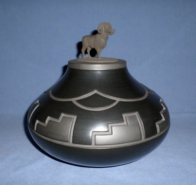 Bighorn Ram lidded Jar Black Jar with Bighorn Sheep, Clouds and Mountains 9-3/8" H X 10-1/4" Dia. 