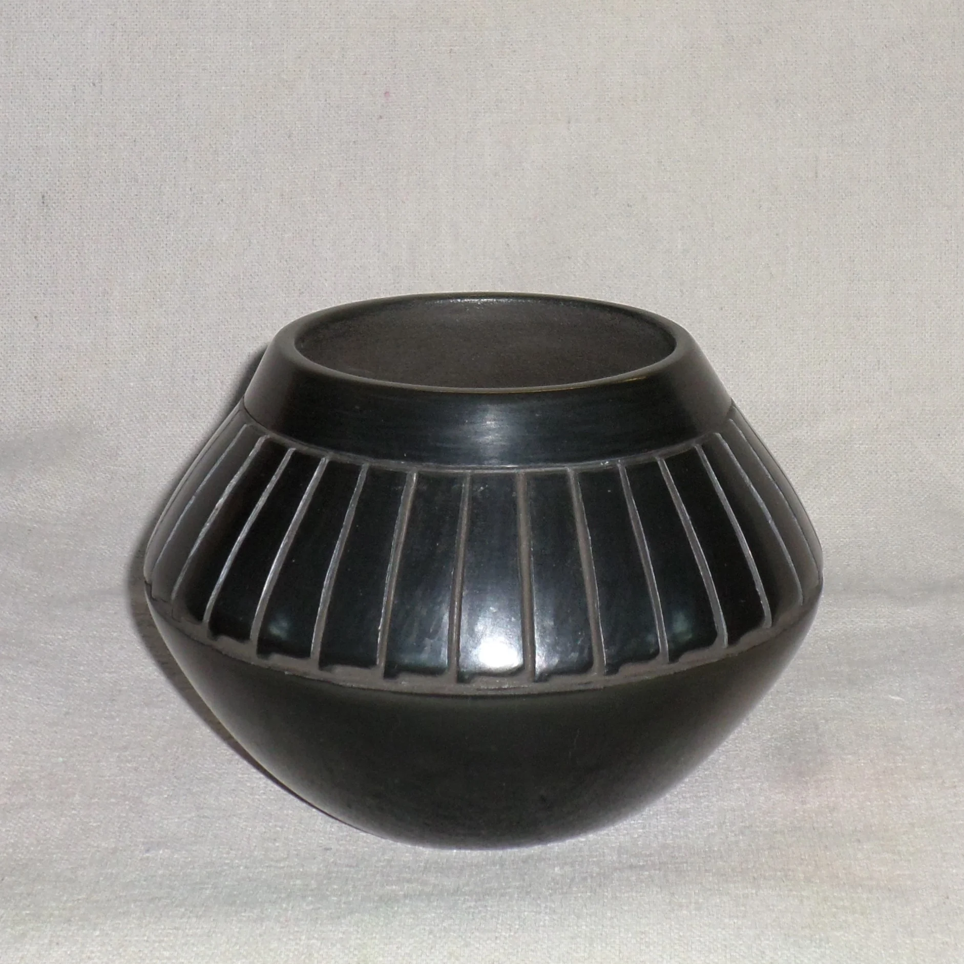 Black Feather Bowl 4-1/2" H X 6-1/4" Dia. Price: $350.