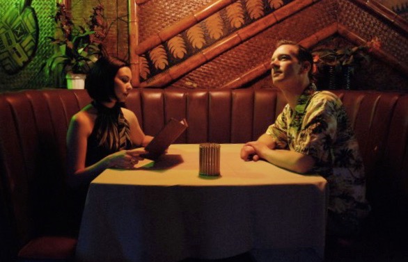 Pumpkin chooses her next tropical cocktail while Sunshine stares into the dim lighting of Don's Dagger Bar. 
