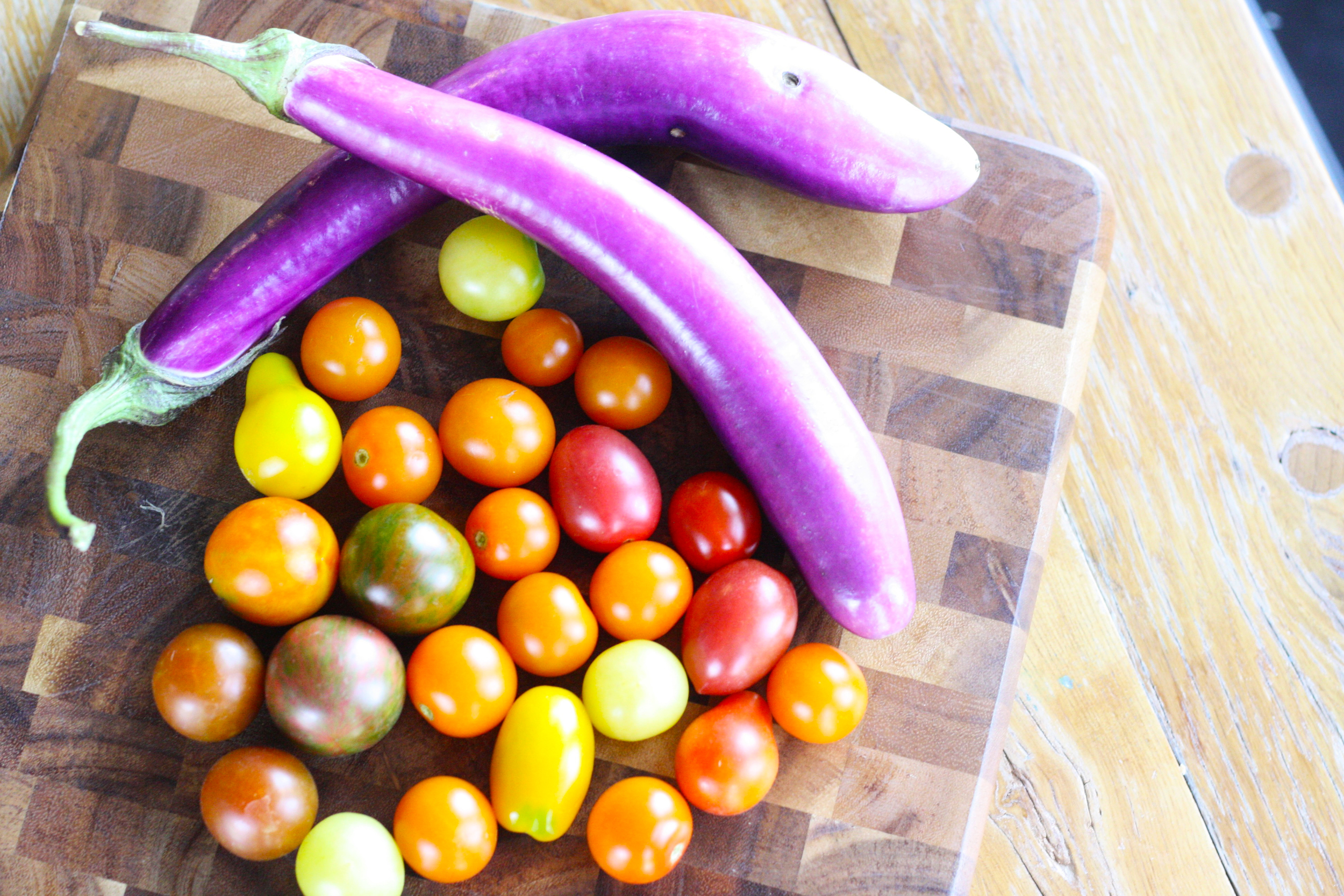 These gorgeous Heirloom Cherry Tomatoes and Asian Eggplant were delivered to us on Thursday from Bridgman Farm. We can't wait to use them!