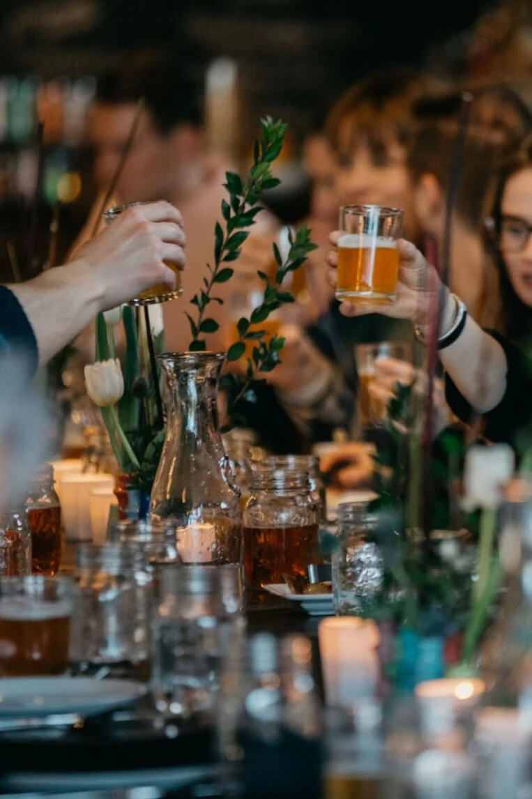 cheers and celebrating at the kitchen columbus wedding venue
