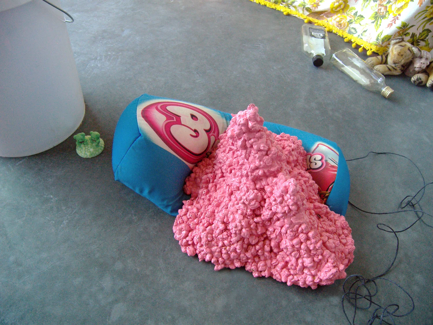  Say Nothing Real Loudly (detail) Installation, performance 2009 20 inches x 15 inches x 10 inches Bubblicious pillow, aluminum casting of two months' worth of chewed gum, pink paint