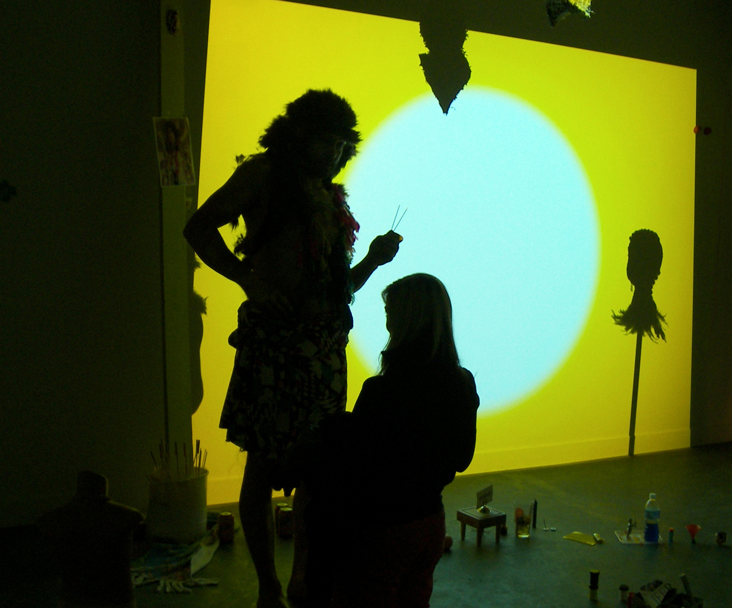  Say Nothing Real Loudly Installation, performance 2009 2 hours At the opening of the exhibition the ordained actor anointed the eyelids of the kneeling devotee with blue paint so they could "see". Any member of the viewing public could worship. "That's What You Get" by Peter Paul and Mary played throughout the gallery on a loop. A video projection slowly moves the space from day to night.