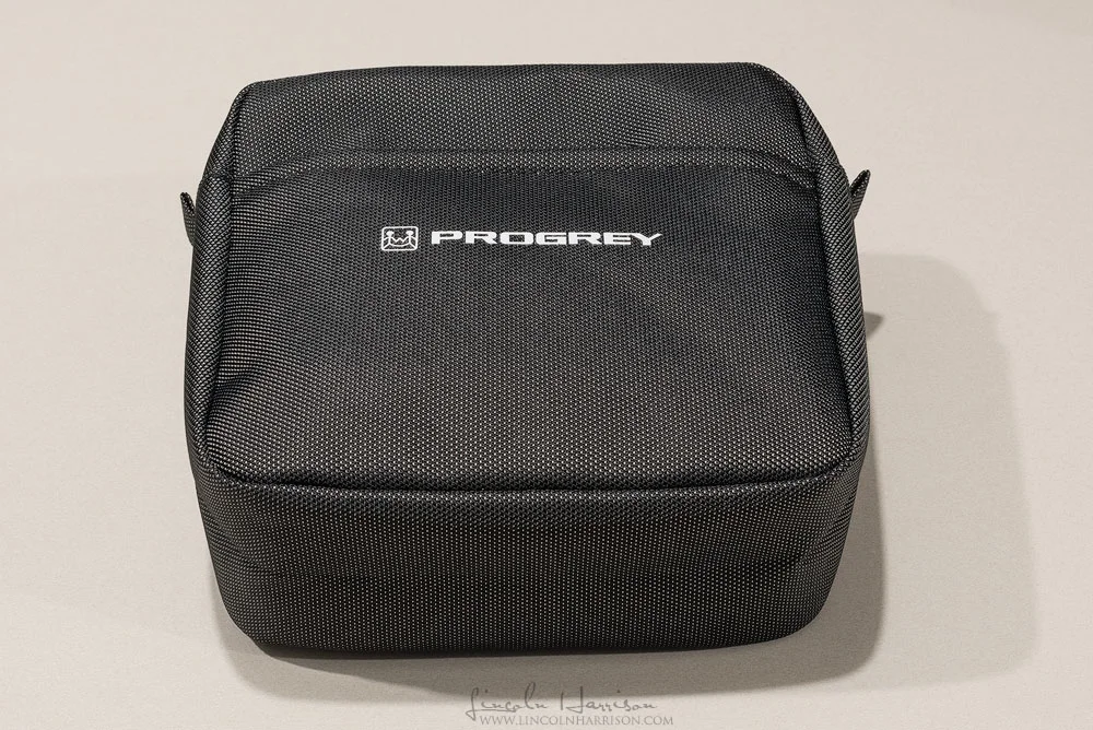 The holder is supplied with a padded pouch which has compartments for the various bits and pieces.