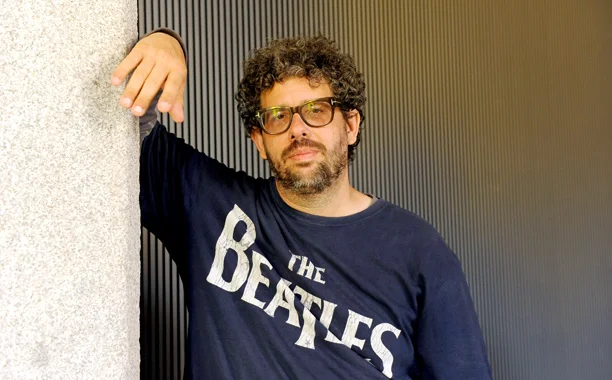 Neil LaBute, not smiling. 