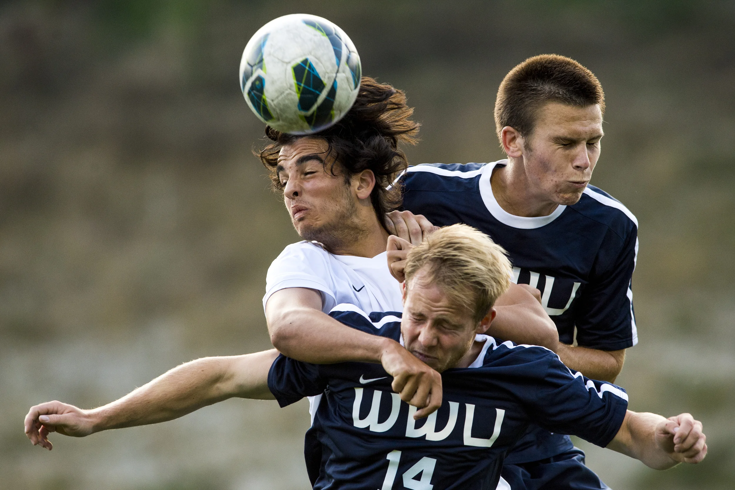 Seattle University's Hamza Haddadi beats out Western's Derek Zimmerman and Pat Cole to head the ball in an exhibition soccer game at Harrington Field on Saturday, Aug. 23, 2014 in Bellingham, Wash. &nbsp;The game was the first to be played at Harrin